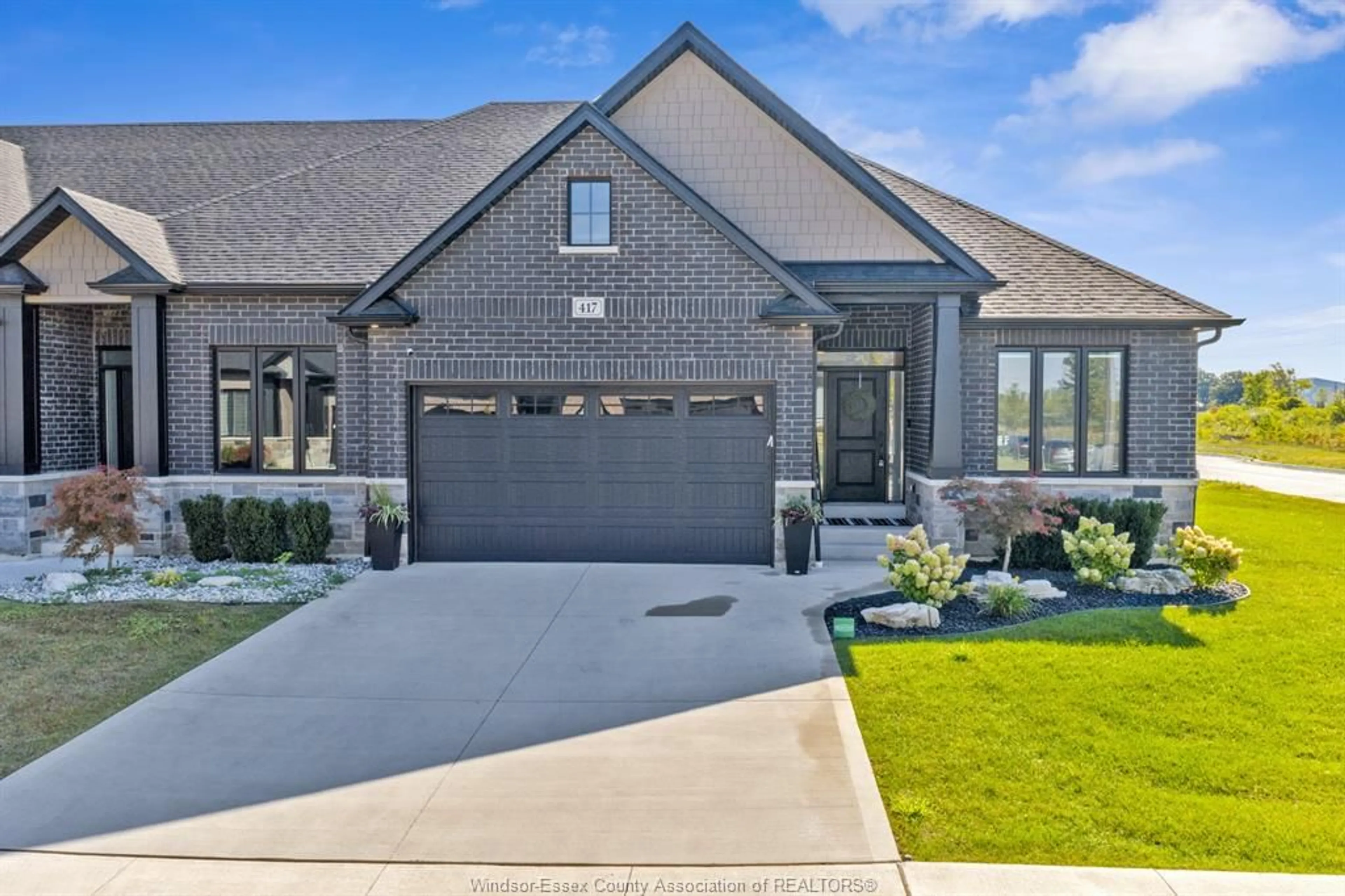 Home with brick exterior material, street for 417 MATESE St, Lakeshore Ontario N8L 0A5