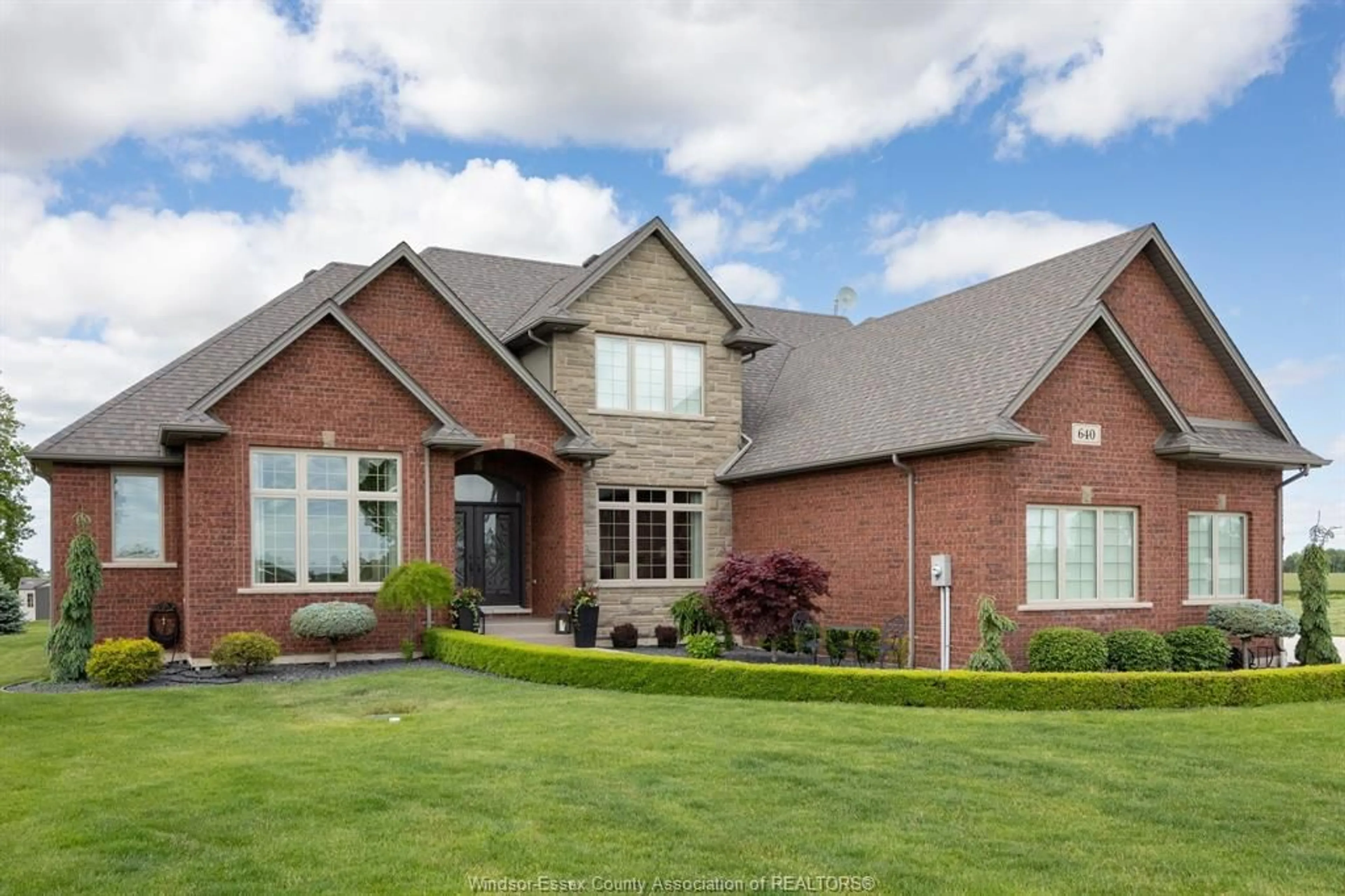 Home with brick exterior material, street for 640 NORTH TALBOT Rd, Lakeshore Ontario N8M 2X7