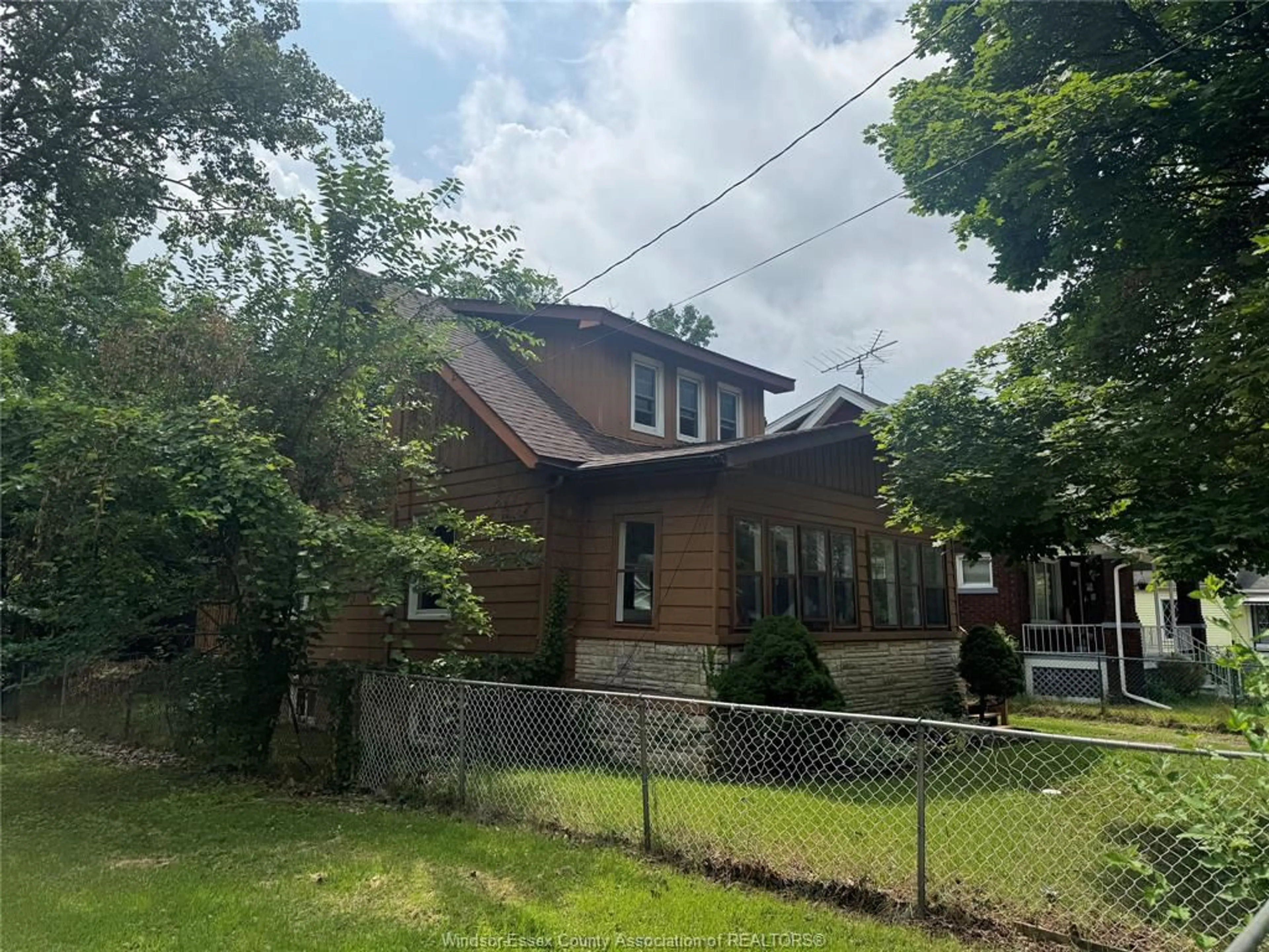 Home with brick exterior material, street for 3641 BLOOMFIELD Rd, Windsor Ontario N9C 1S1