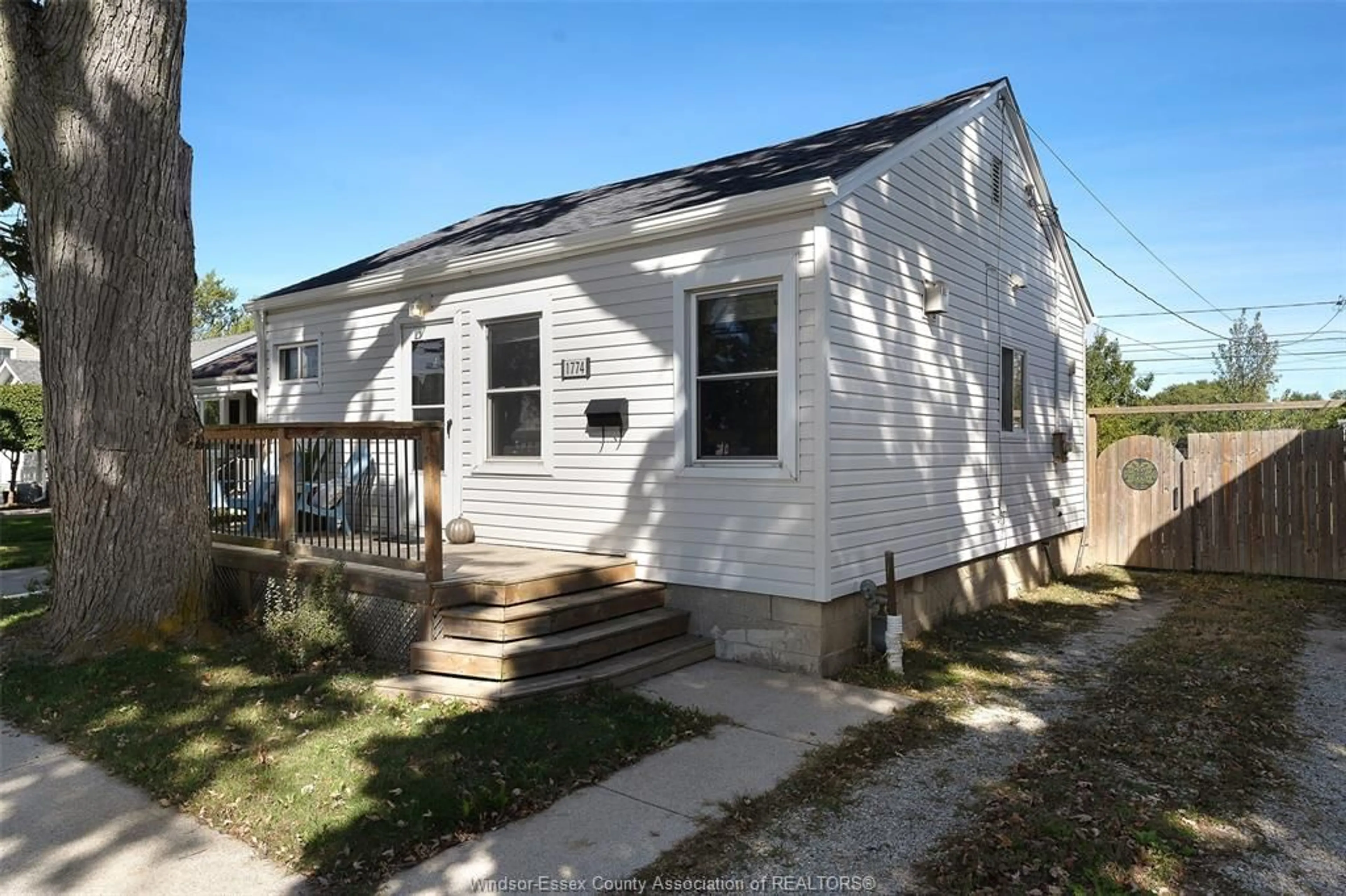Home with vinyl exterior material, street for 1774 TOURANGEAU, Windsor Ontario N8Y 4J8