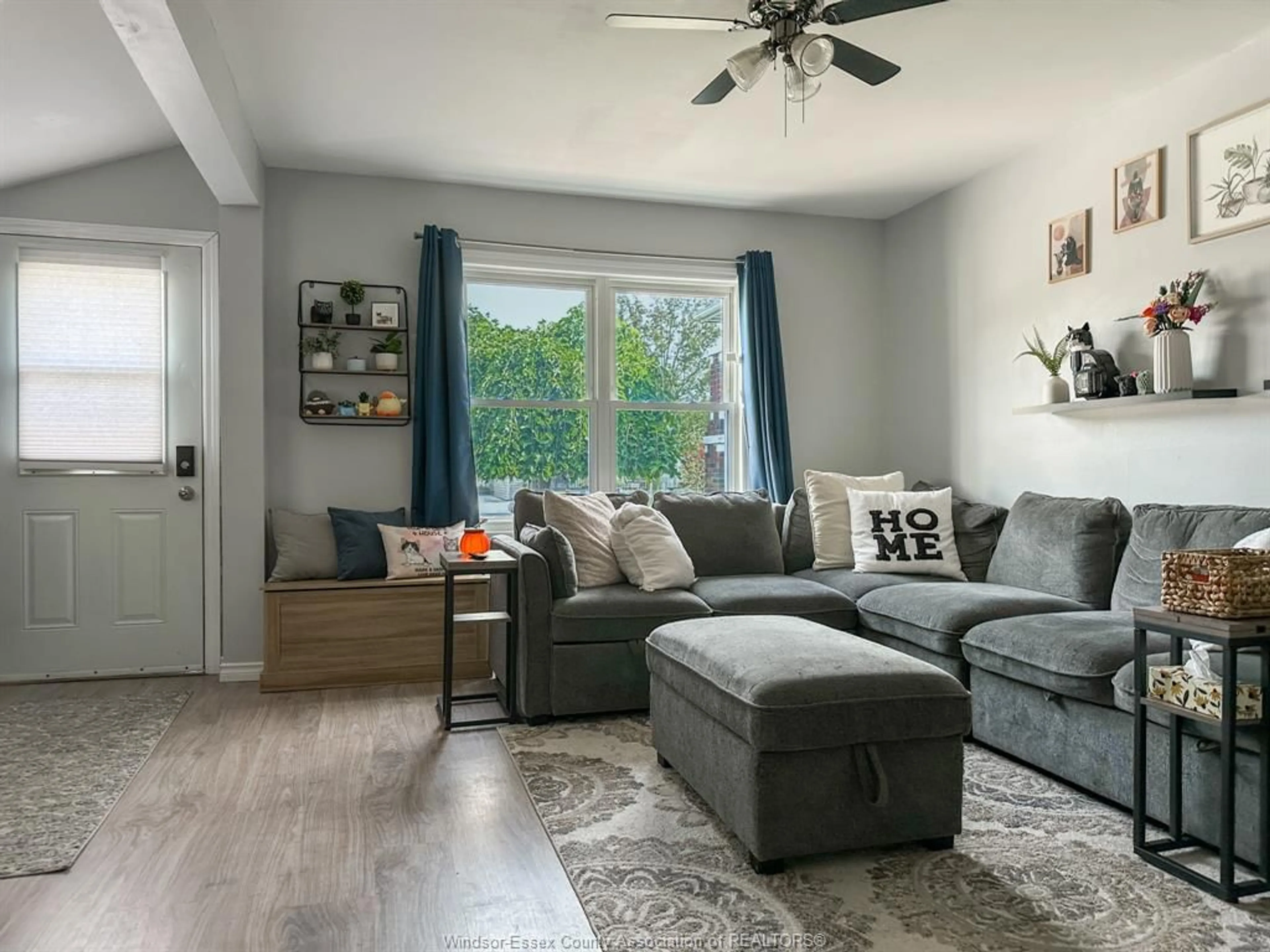 Living room with furniture, wood/laminate floor for 1639 ST LUKE, Windsor Ontario N8Y 3N4