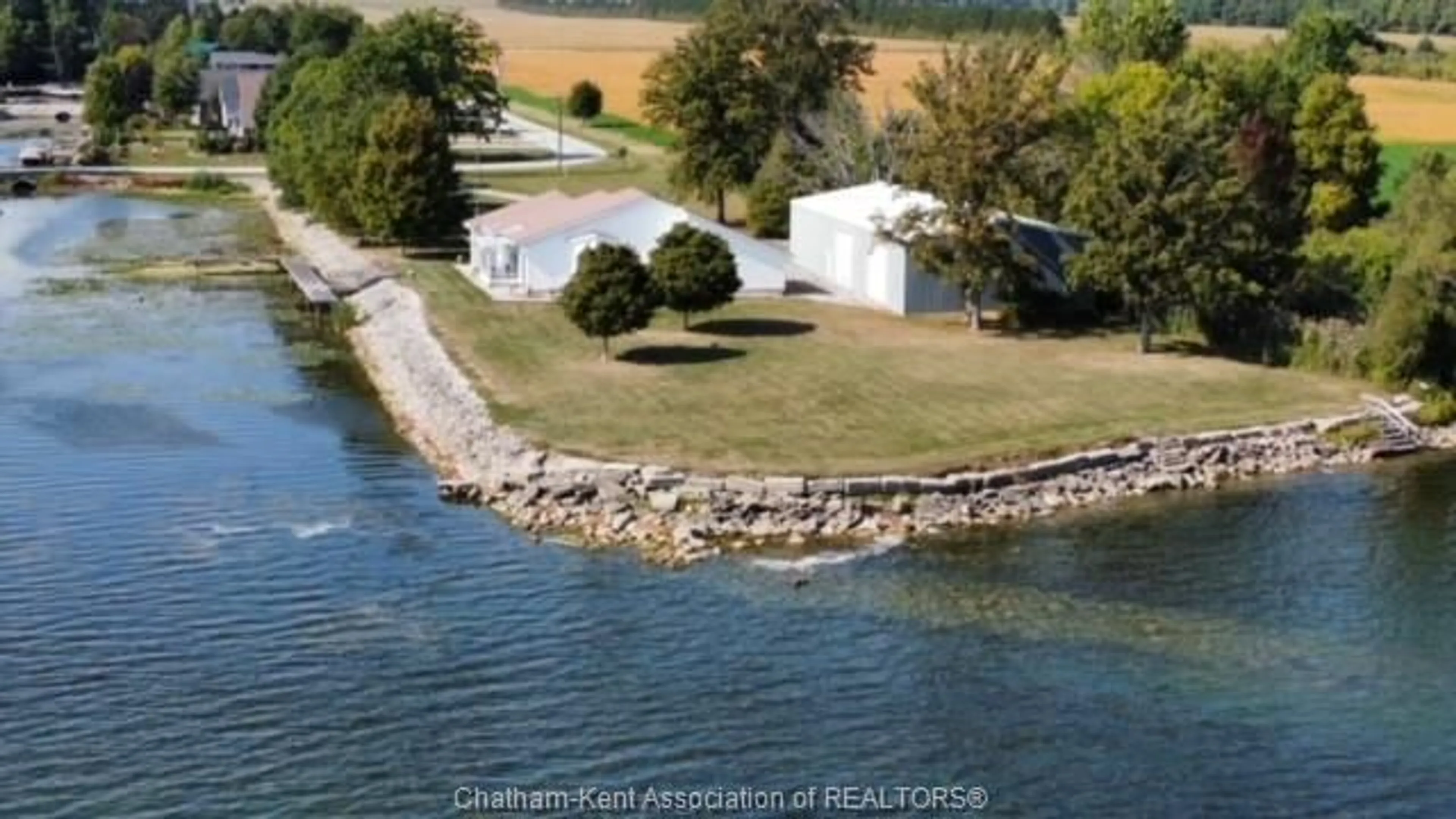 A pic from outside/outdoor area/front of a property/back of a property/a pic from drone, water/lake/river/ocean view for 11544 RONDEAU Dr, Rondeau Bay Estates Ontario N0P 1X0