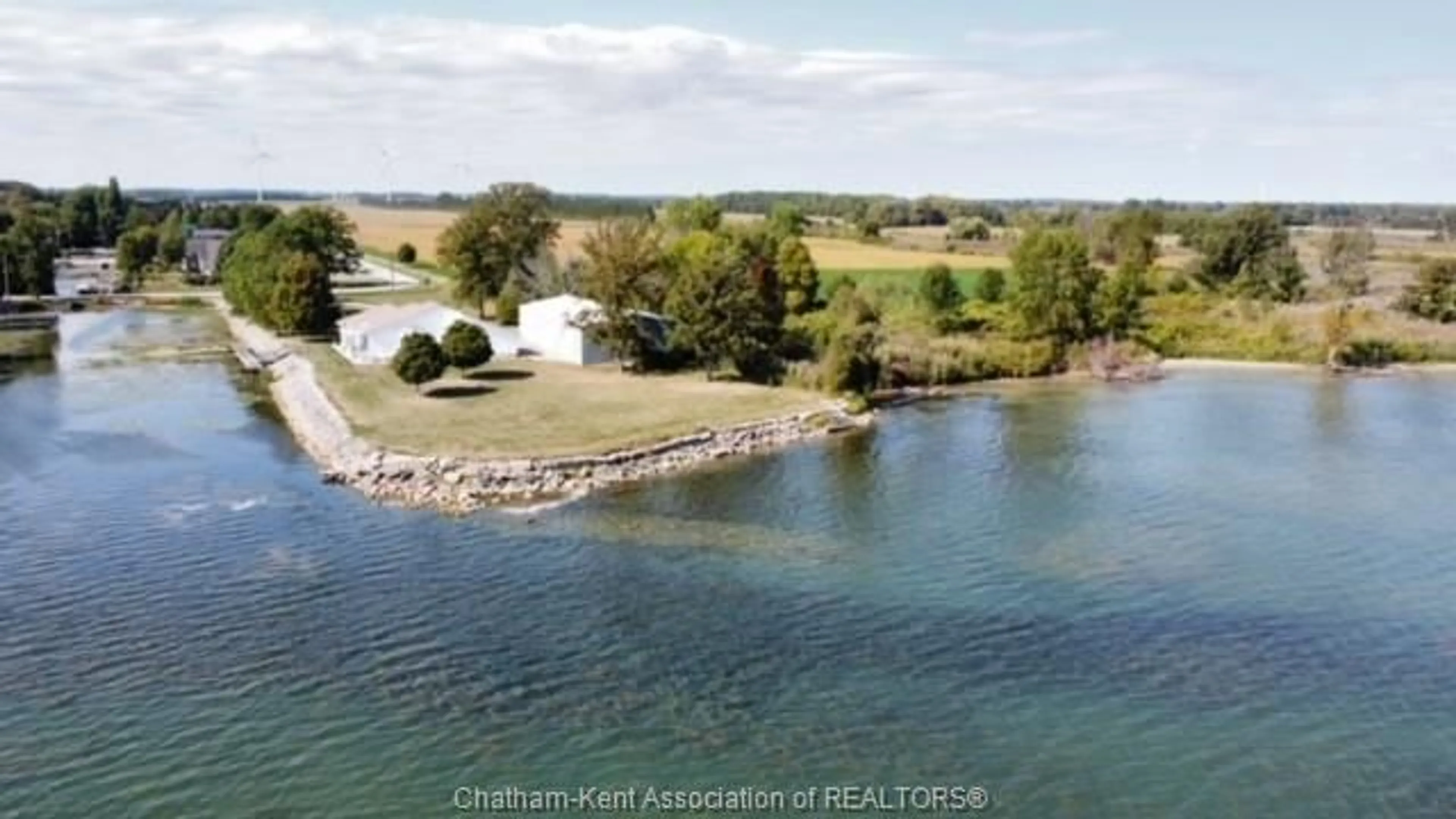 A pic from outside/outdoor area/front of a property/back of a property/a pic from drone, water/lake/river/ocean view for 11544 RONDEAU Dr, Rondeau Bay Estates Ontario N0P 1X0