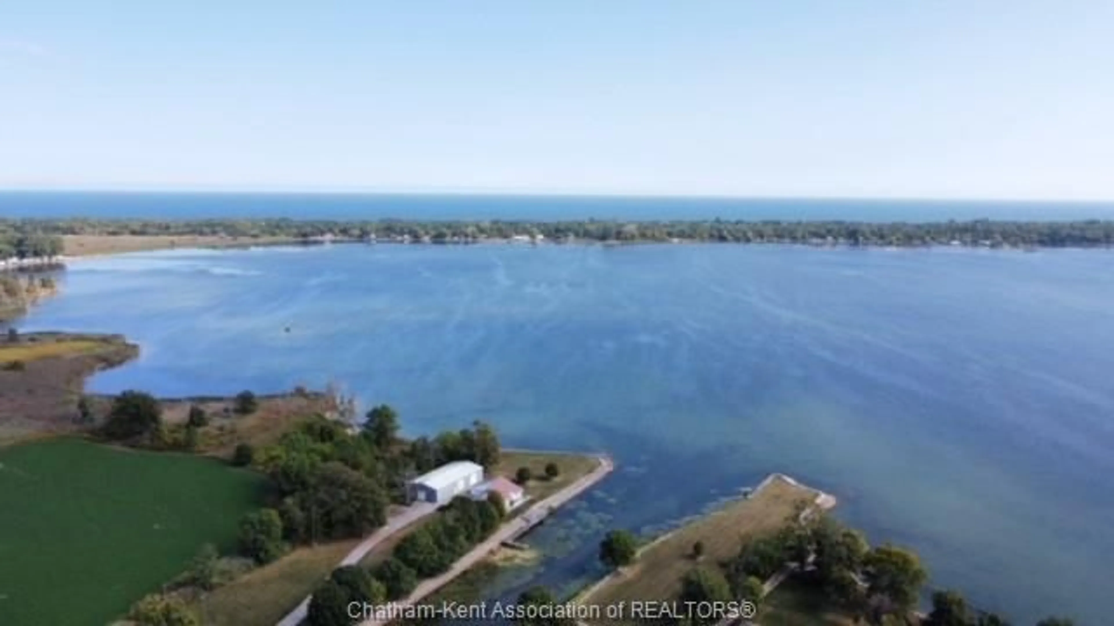 A pic from outside/outdoor area/front of a property/back of a property/a pic from drone, water/lake/river/ocean view for 11544 RONDEAU Dr, Rondeau Bay Estates Ontario N0P 1X0