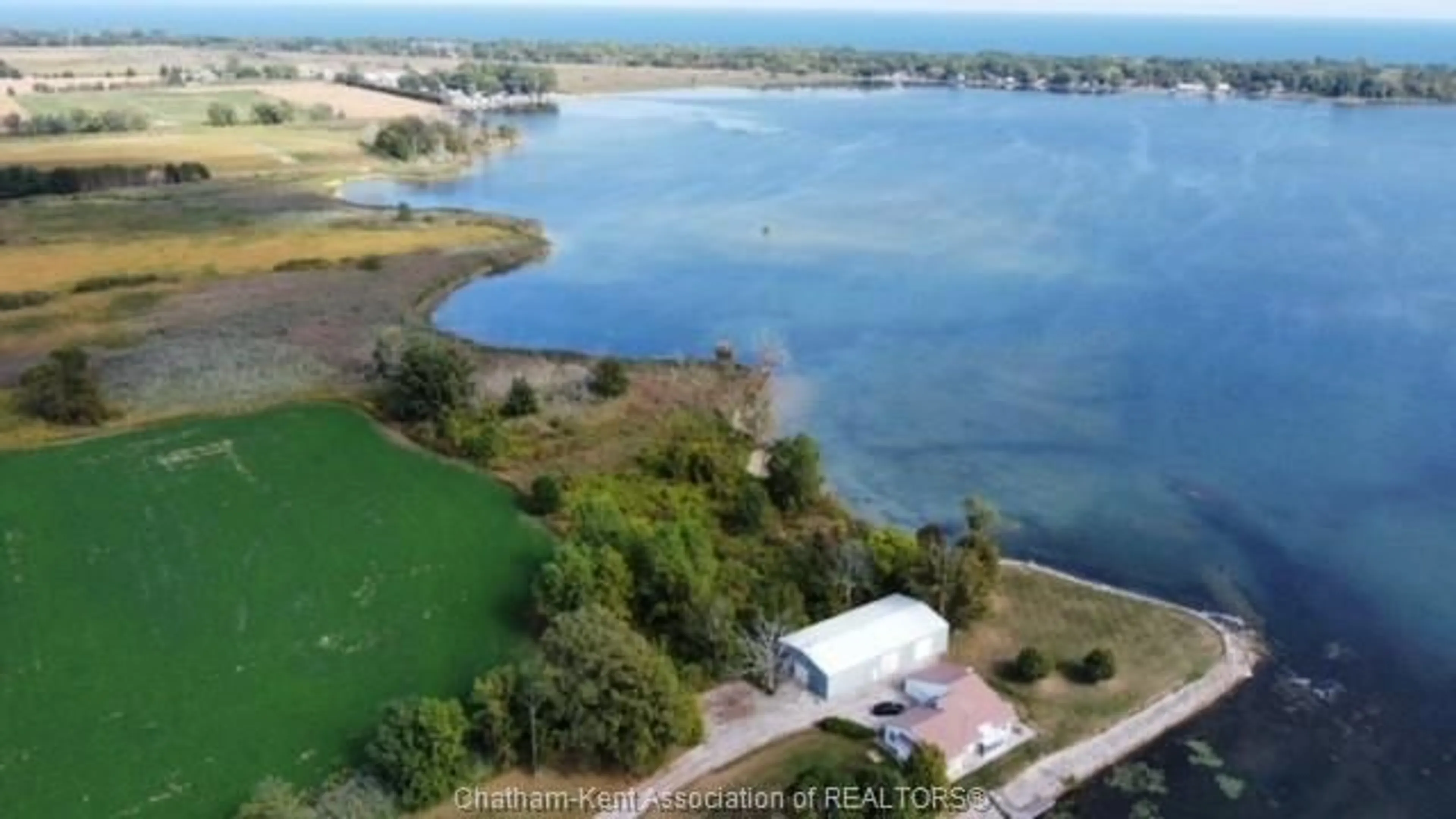 A pic from outside/outdoor area/front of a property/back of a property/a pic from drone, water/lake/river/ocean view for 11544 RONDEAU Dr, Rondeau Bay Estates Ontario N0P 1X0