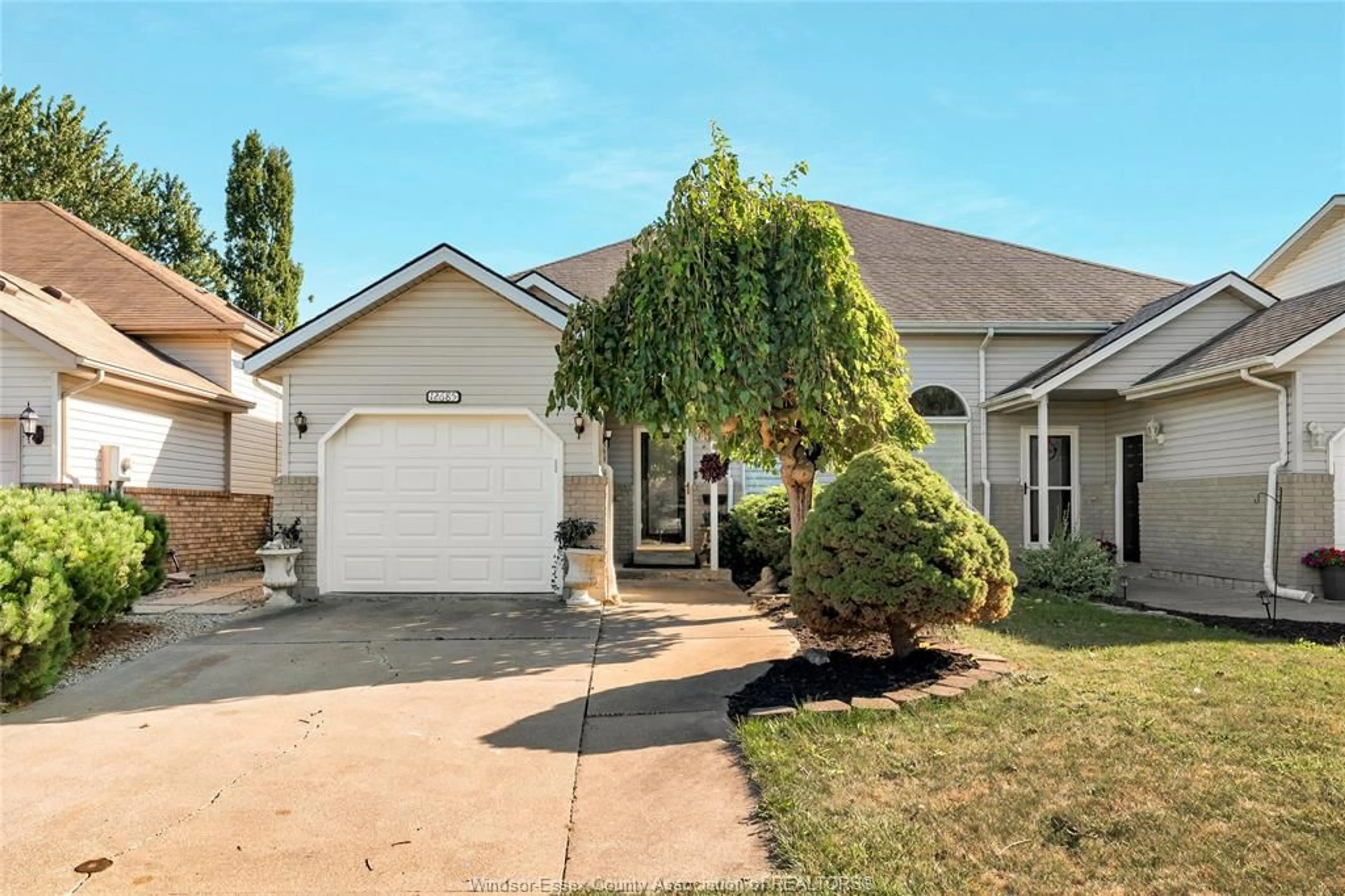 Home with vinyl exterior material, street for 12685 HORWOOD Cres, Tecumseh Ontario N8N 4T8