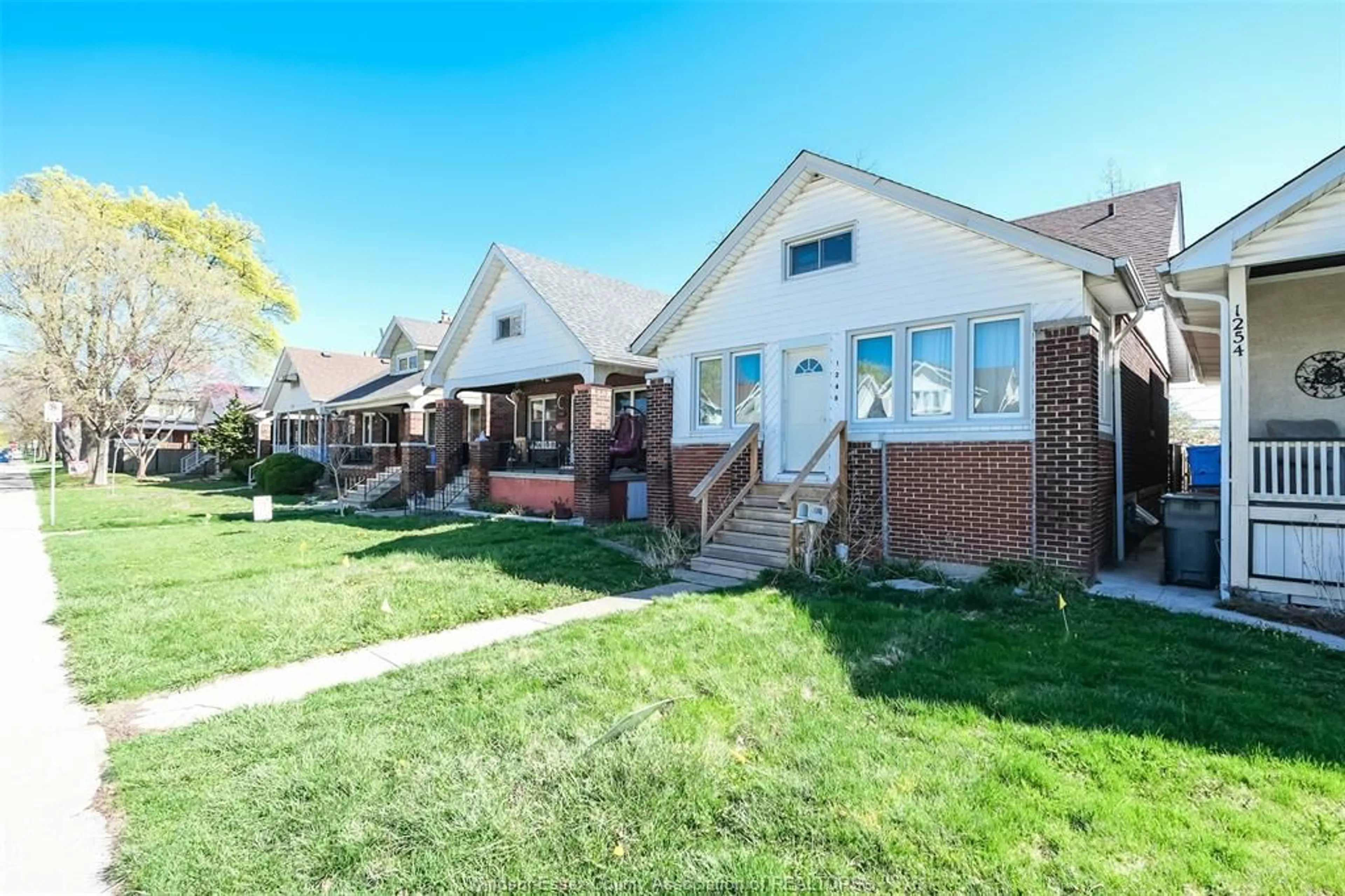 Home with brick exterior material, street for 1248 BRUCE Ave, Windsor Ontario N8X 1X3