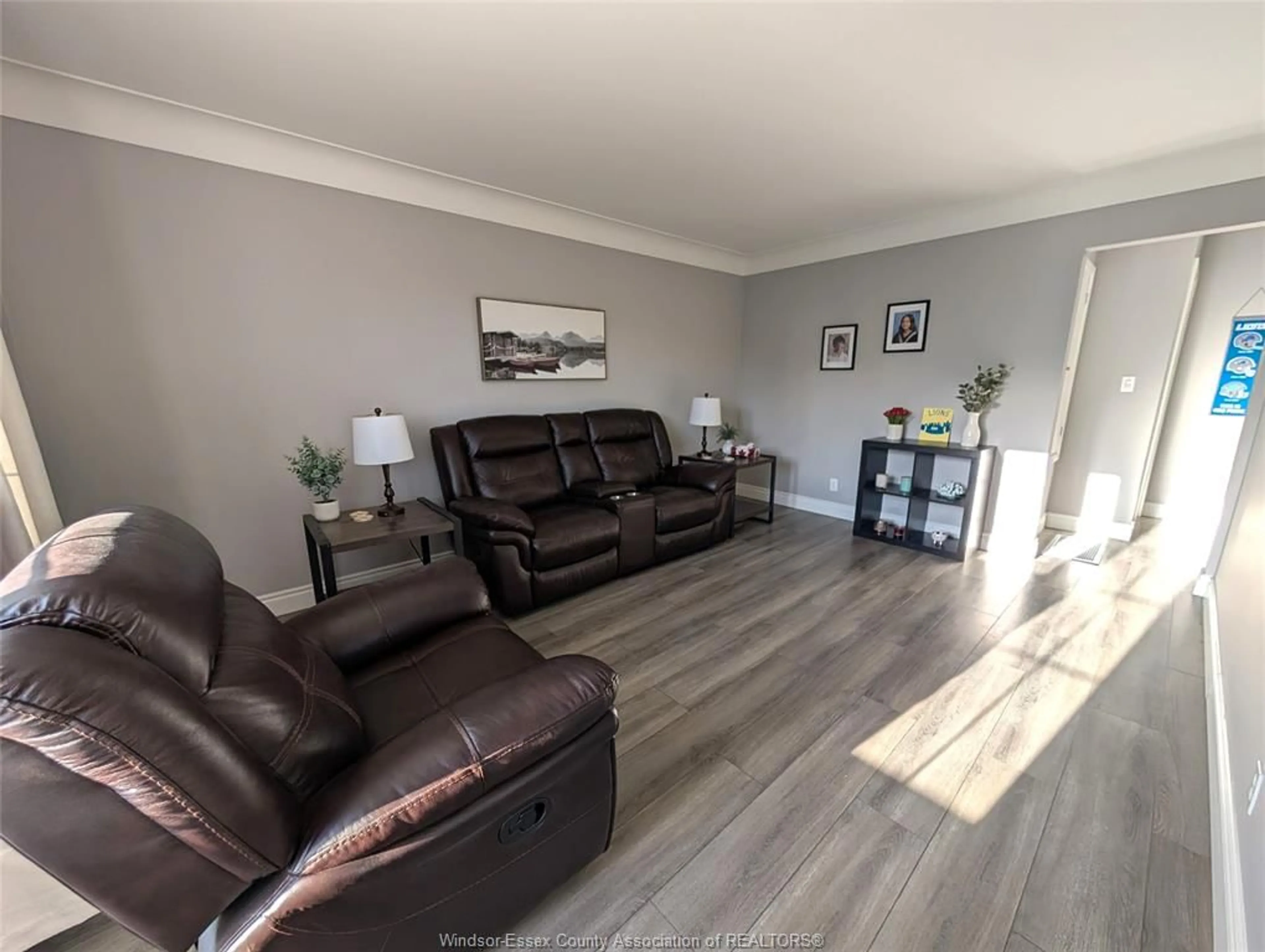 Living room with furniture, wood/laminate floor for 1542 ELSMERE, Windsor Ontario N8X 4H3