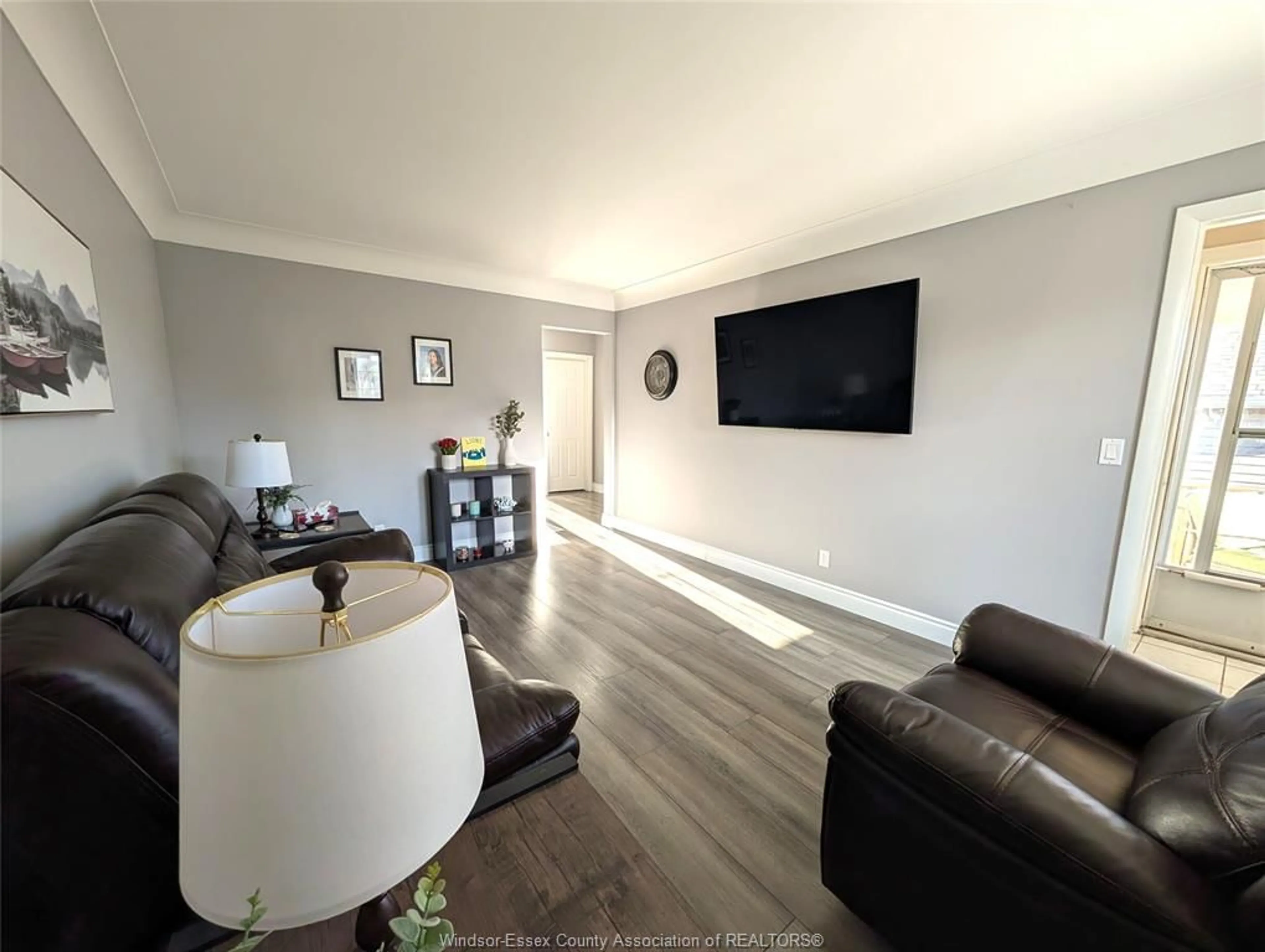 Living room with furniture, wood/laminate floor for 1542 ELSMERE, Windsor Ontario N8X 4H3