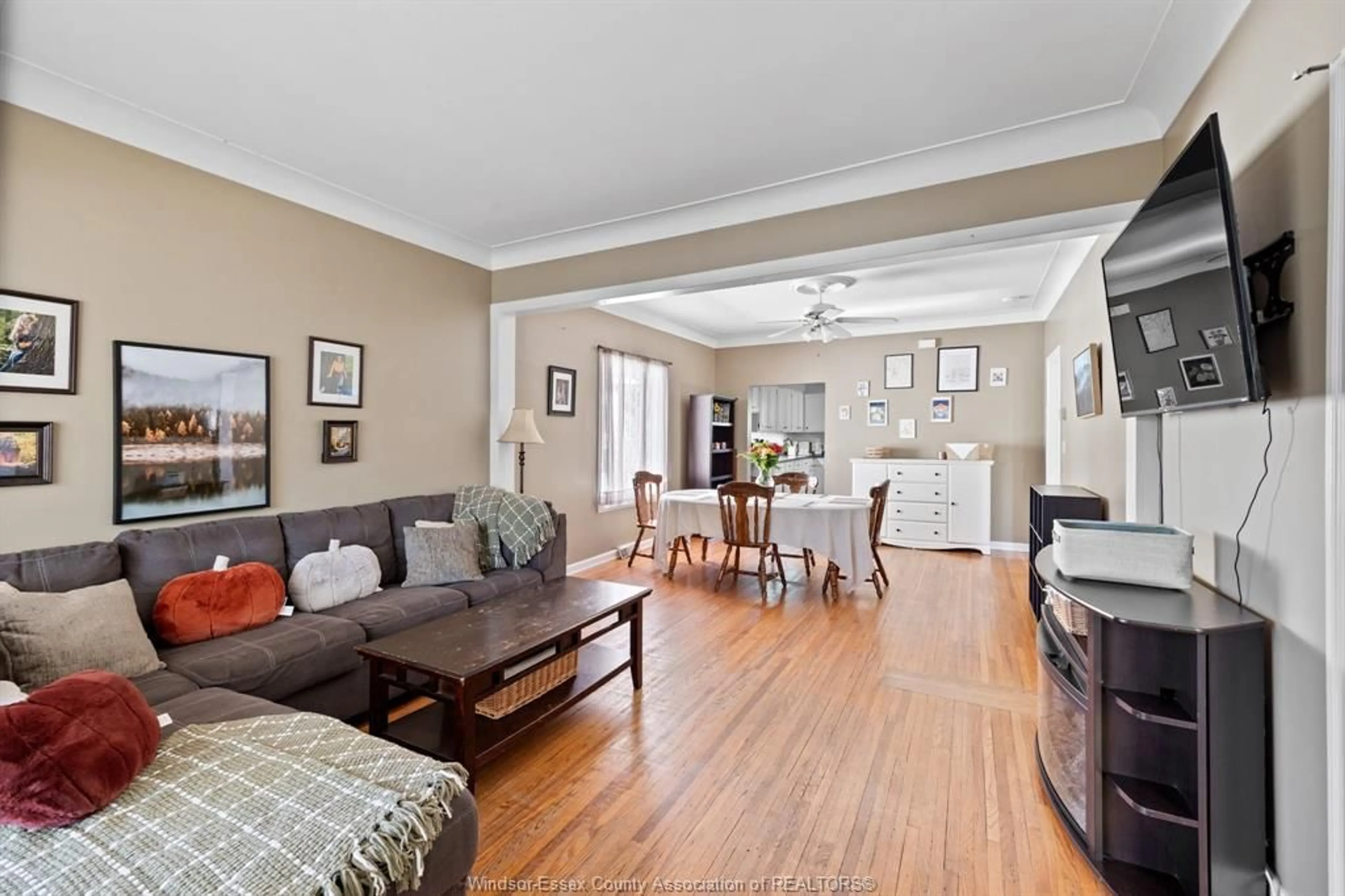 Living room with furniture, wood/laminate floor for 338 MCEWAN Ave, Windsor Ontario N9B 2E6