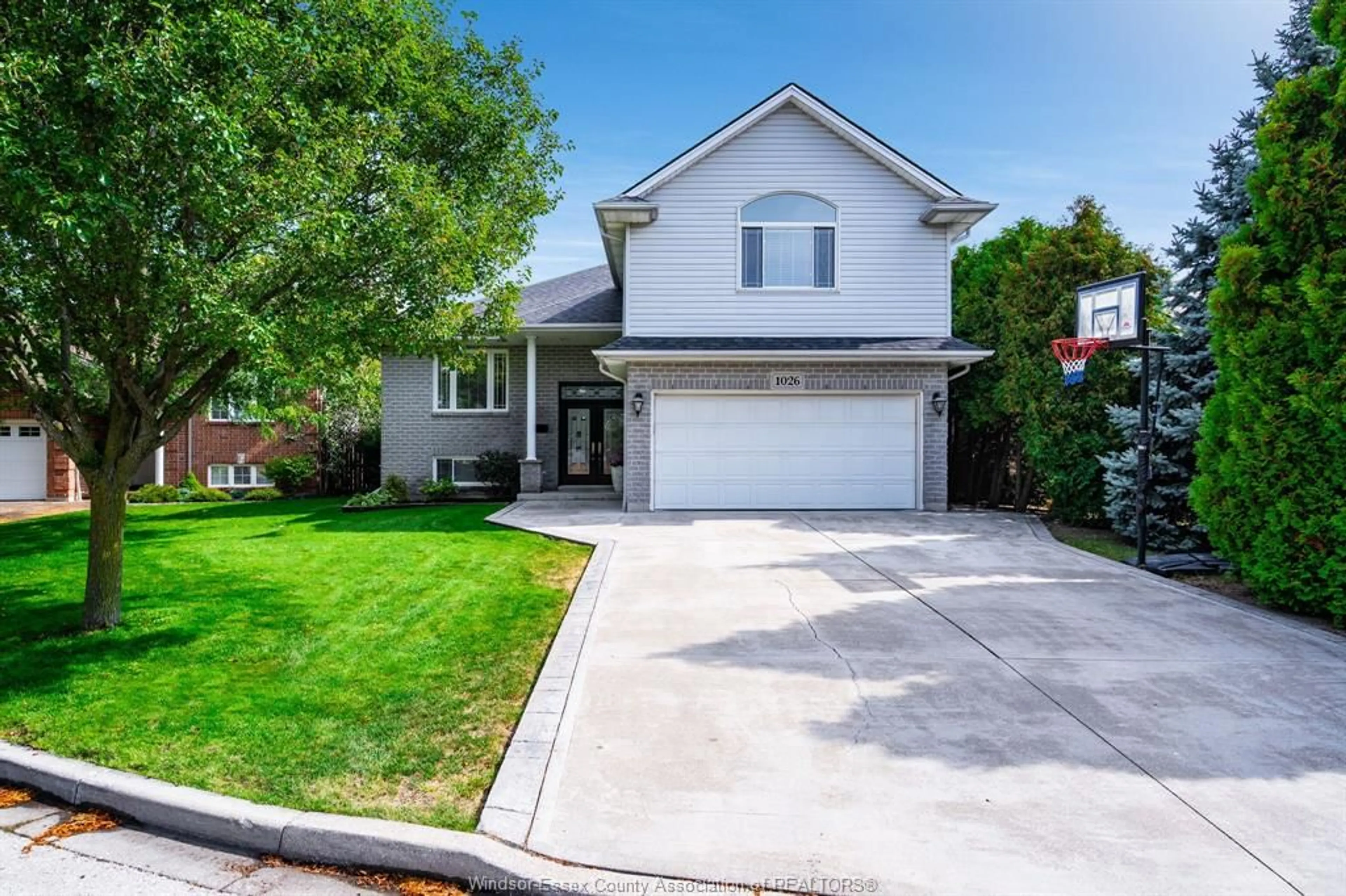Home with vinyl exterior material, street for 1026 Treverton, Windsor Ontario N8P 1K2