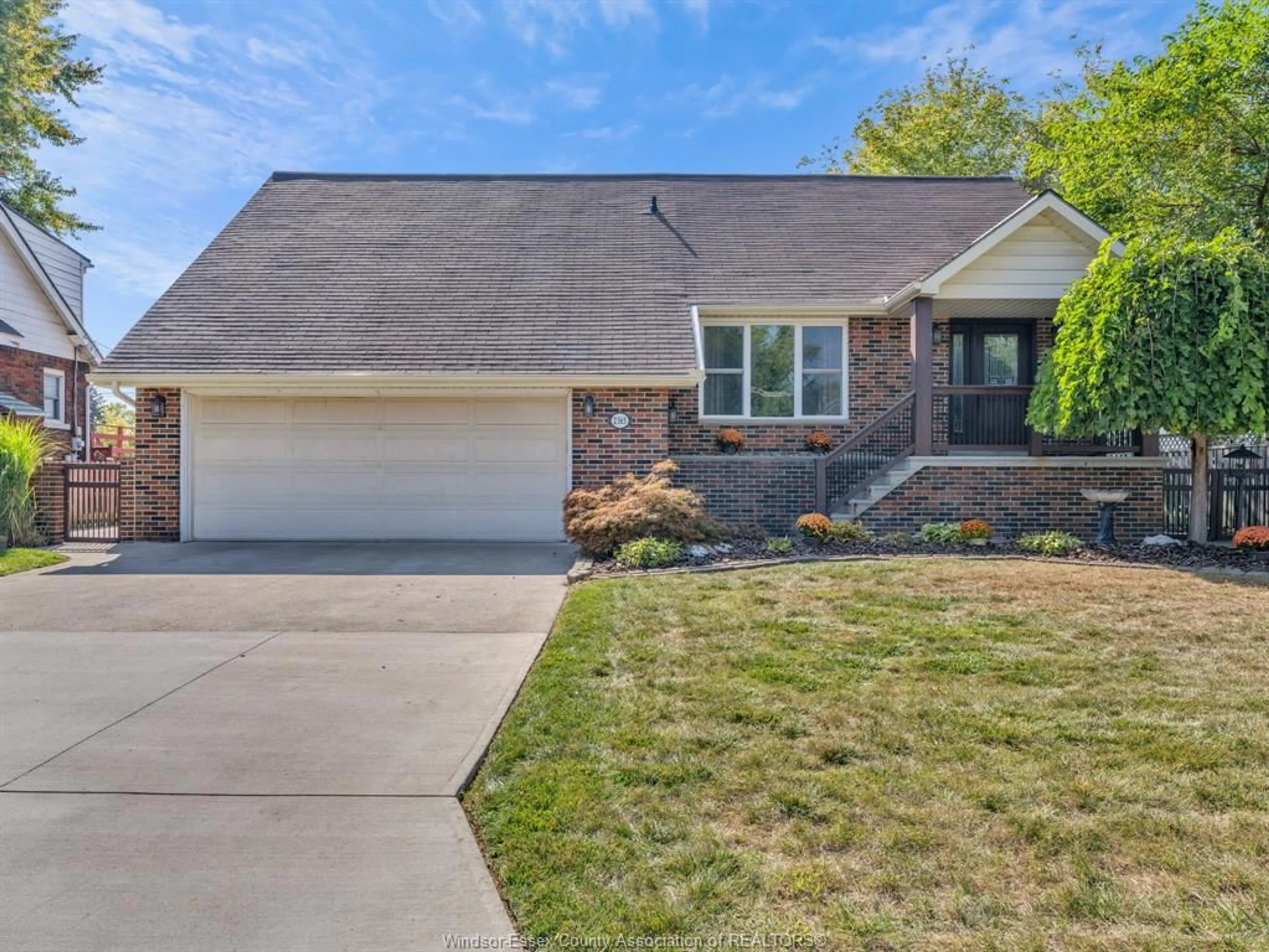 Home with brick exterior material, street for 2365 Norman, Windsor Ontario N8T 1S6