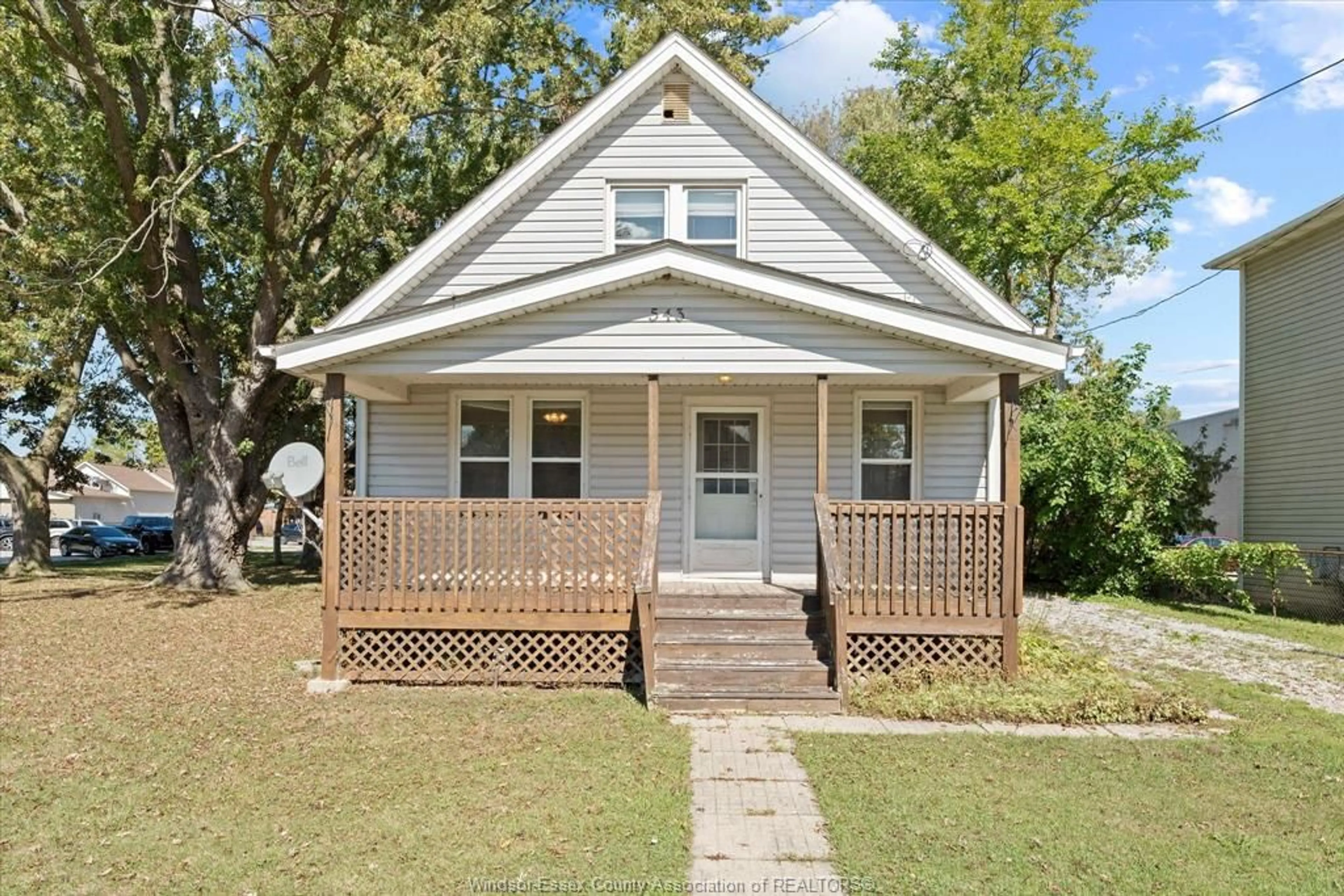 Home with vinyl exterior material, street for 543 St. Charles St, Belle River Ontario N0R 1A0