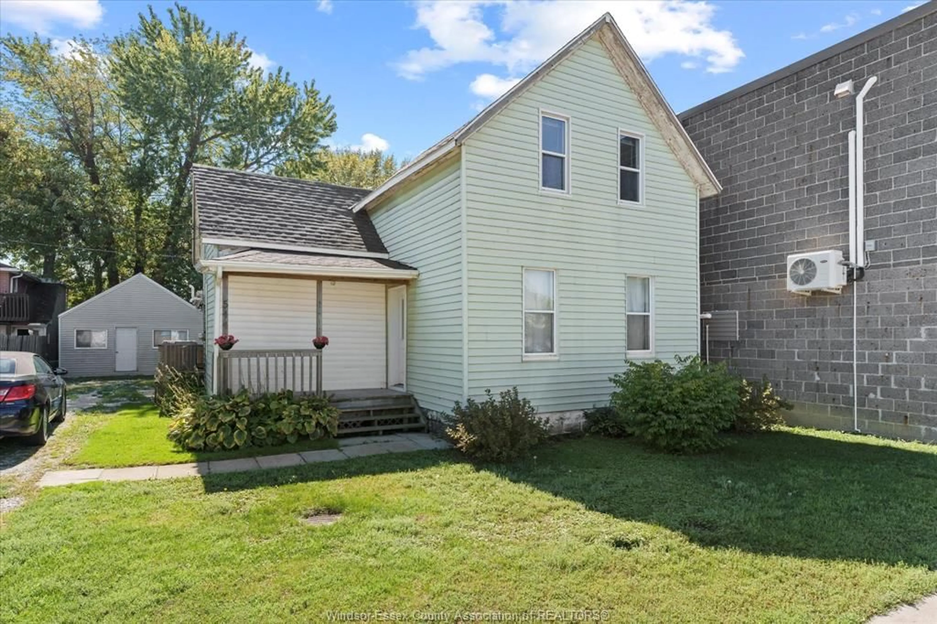 A pic from outside/outdoor area/front of a property/back of a property/a pic from drone, street for 544 Notre Dame, Belle River Ontario N0R 1A0
