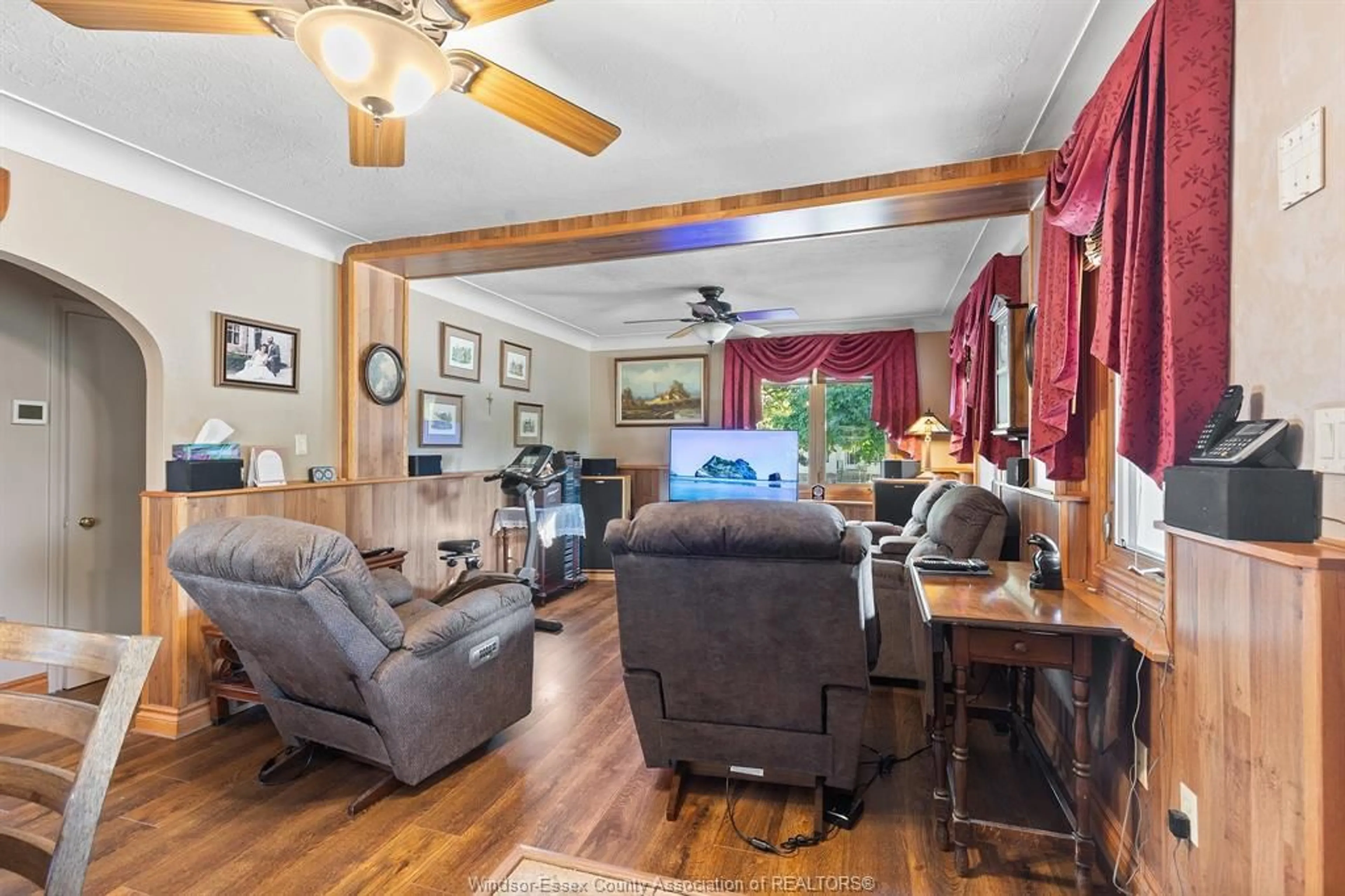 Living room with furniture, wood/laminate floor for 12374 RENAUD St, Tecumseh Ontario N8N 1P6