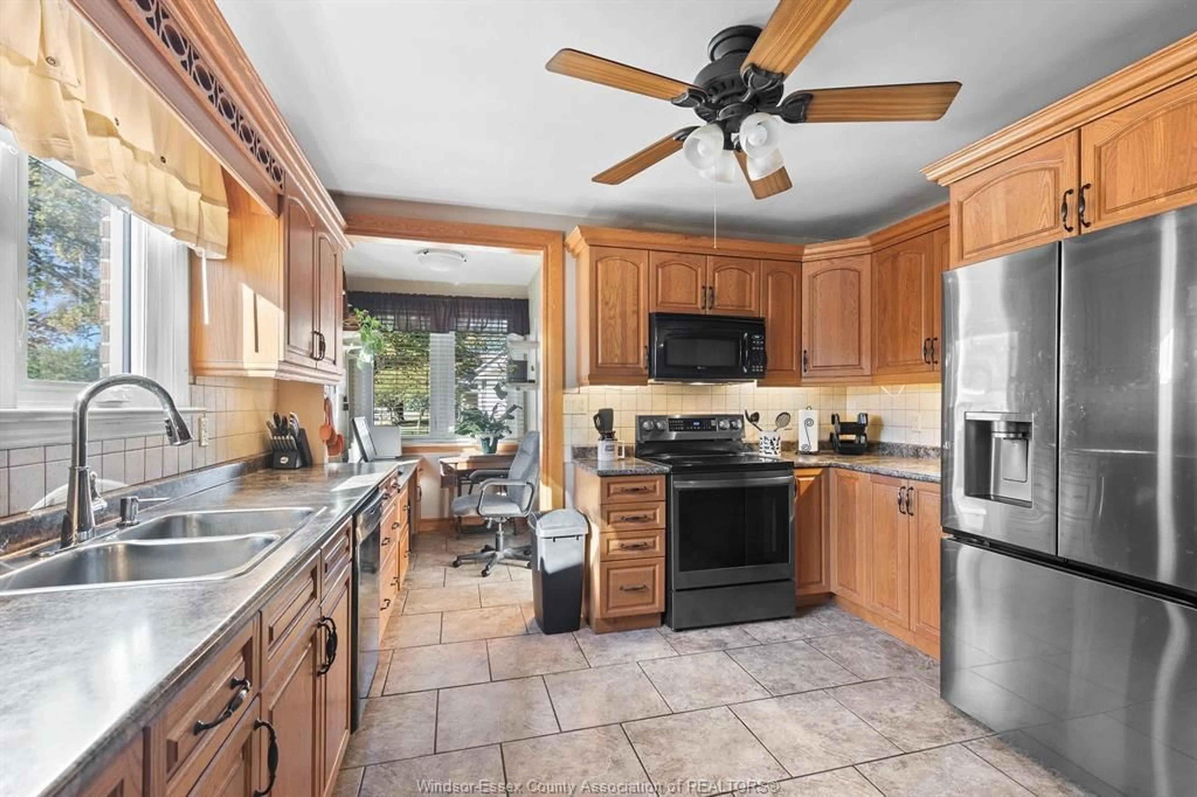 Open concept kitchen, ceramic/tile floor for 12374 RENAUD St, Tecumseh Ontario N8N 1P6