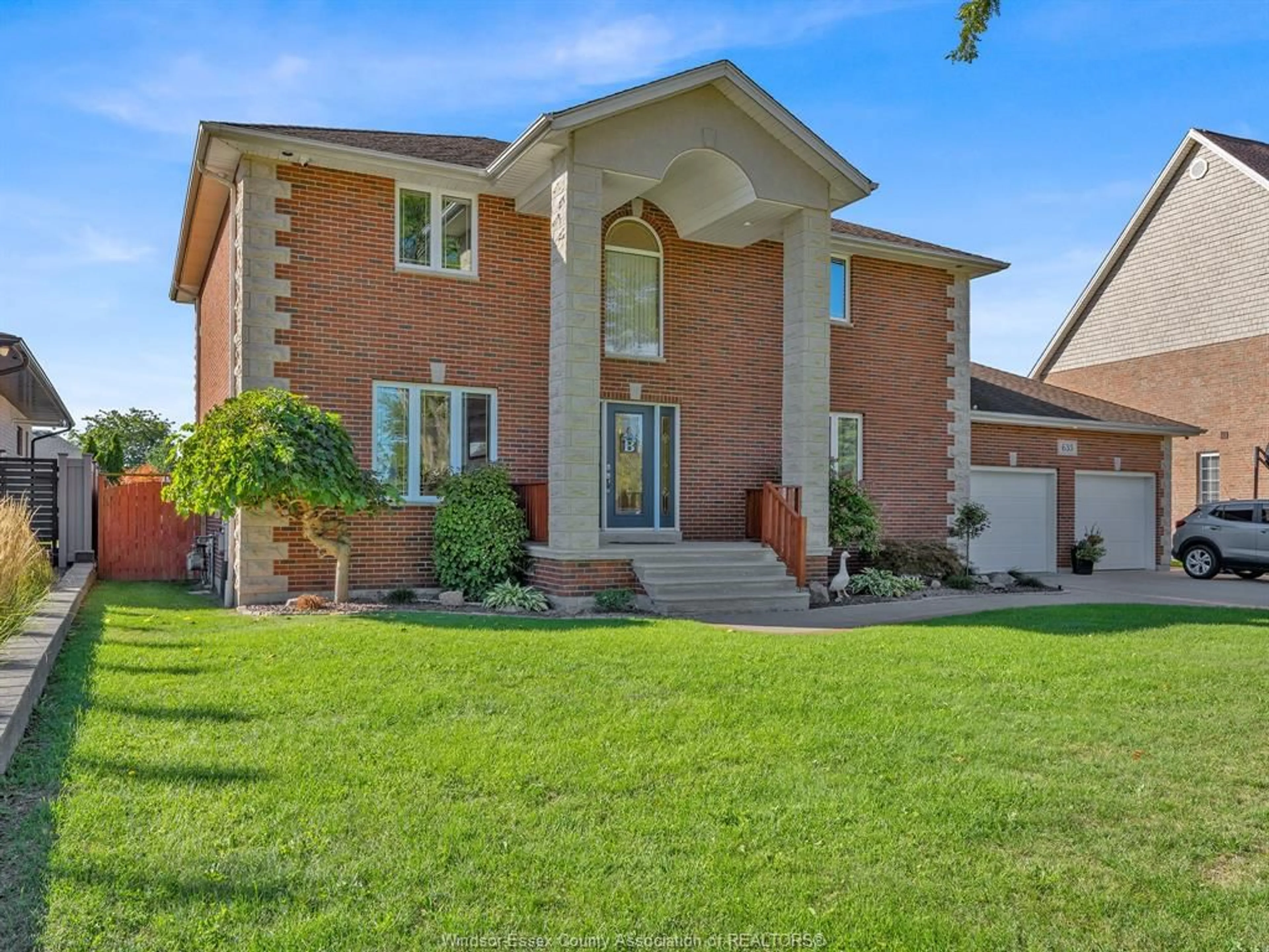Home with brick exterior material, street for 633 OLD TECUMSEH Rd, Lakeshore Ontario N0R 1A0