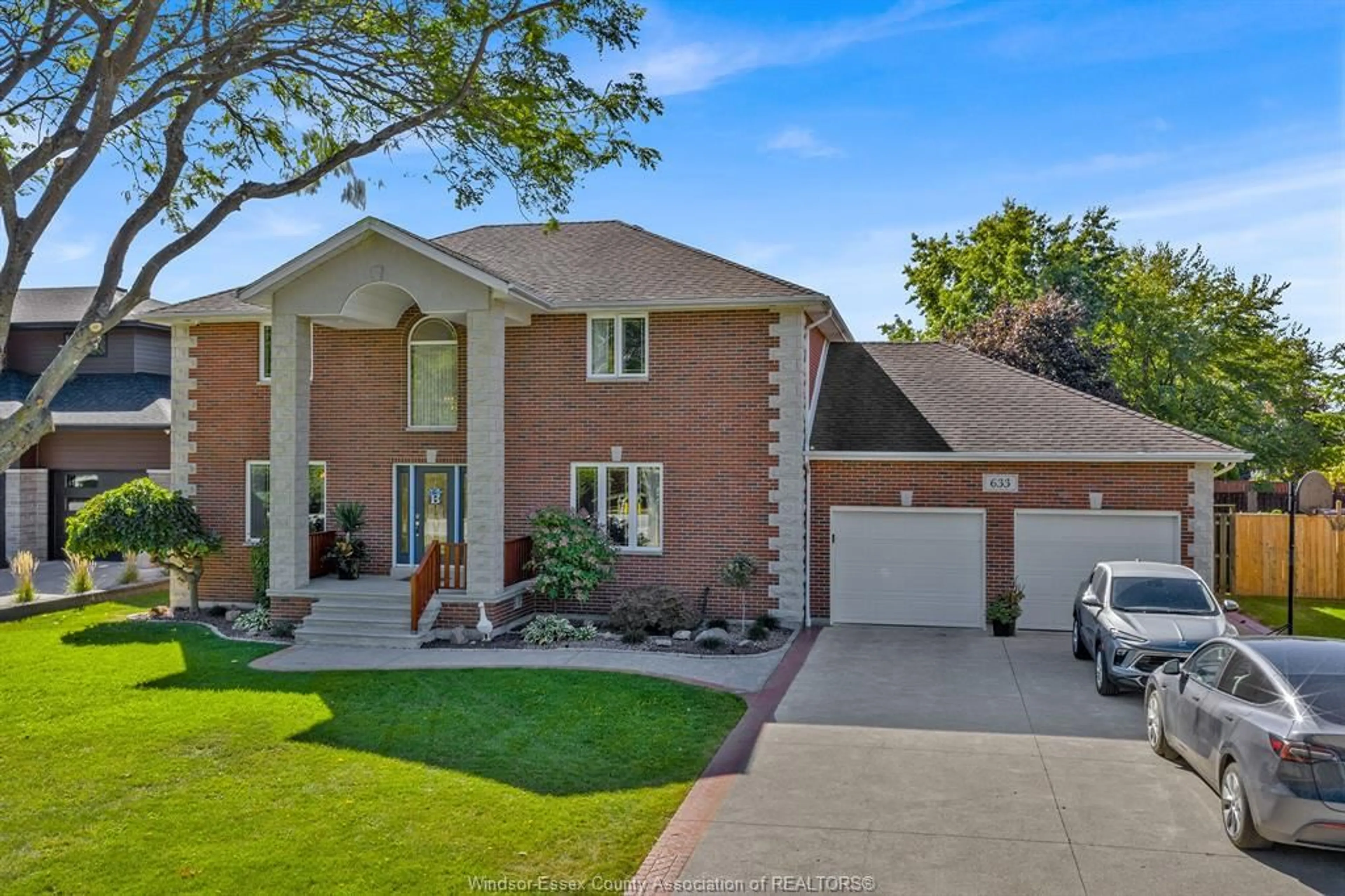 Home with brick exterior material, street for 633 OLD TECUMSEH Rd, Lakeshore Ontario N0R 1A0