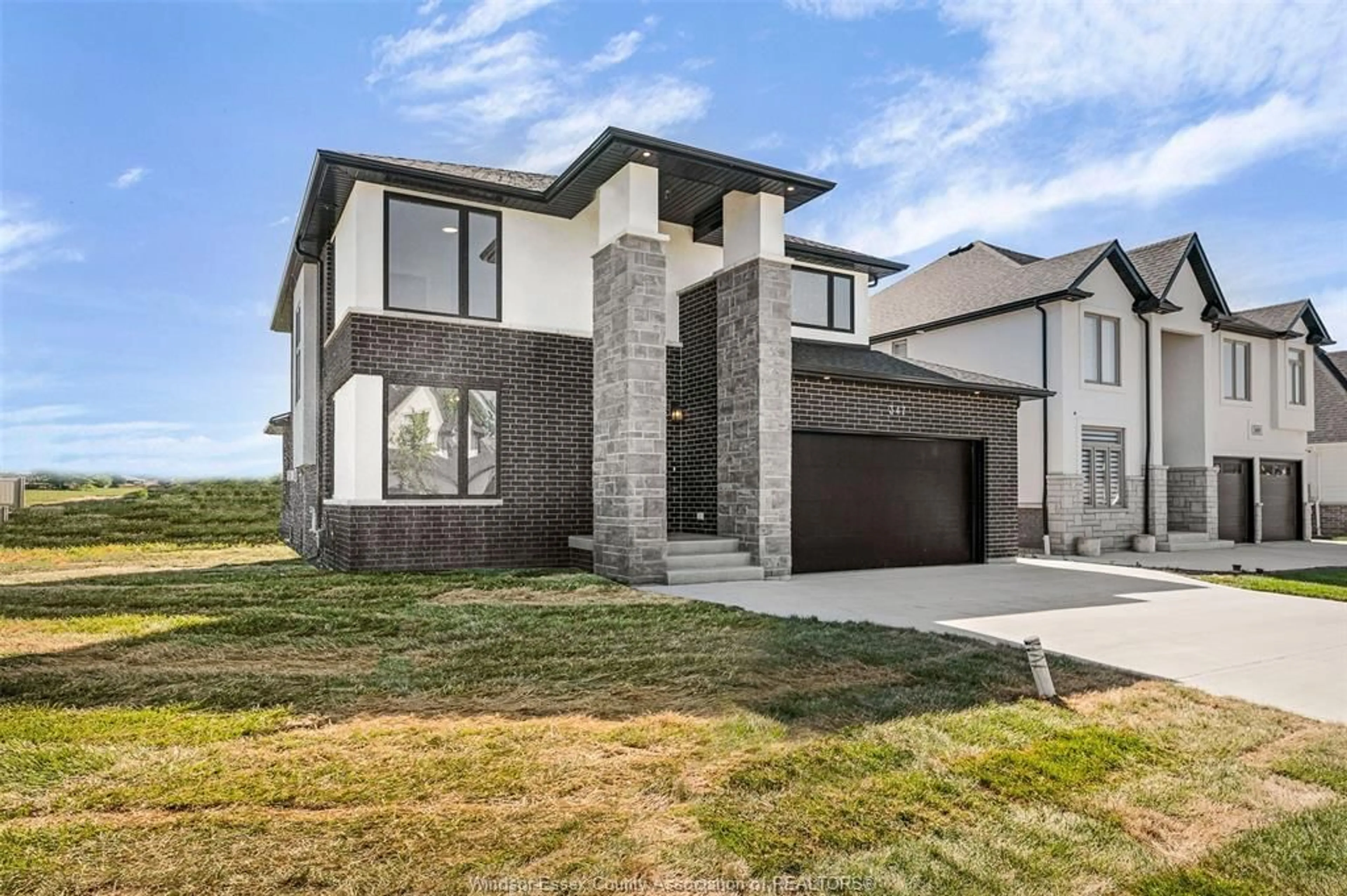 Home with brick exterior material, street for 347 CHRISTINE Ave, Belle River Ontario N0R 1A0