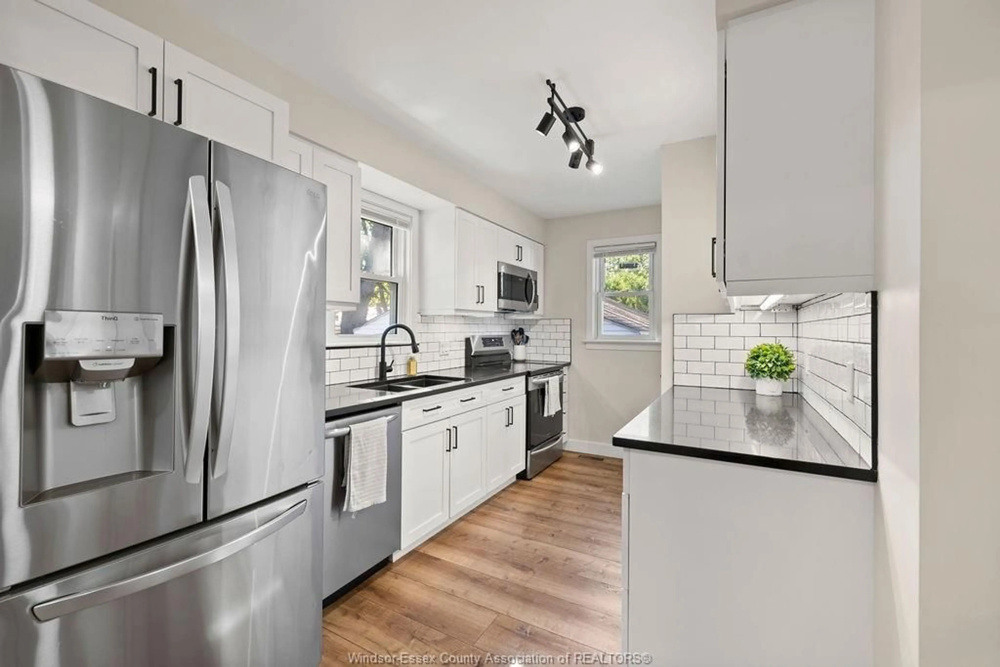 Open concept kitchen, ceramic/tile floor for 3429 DOMINION, Windsor Ontario N9E 2N8