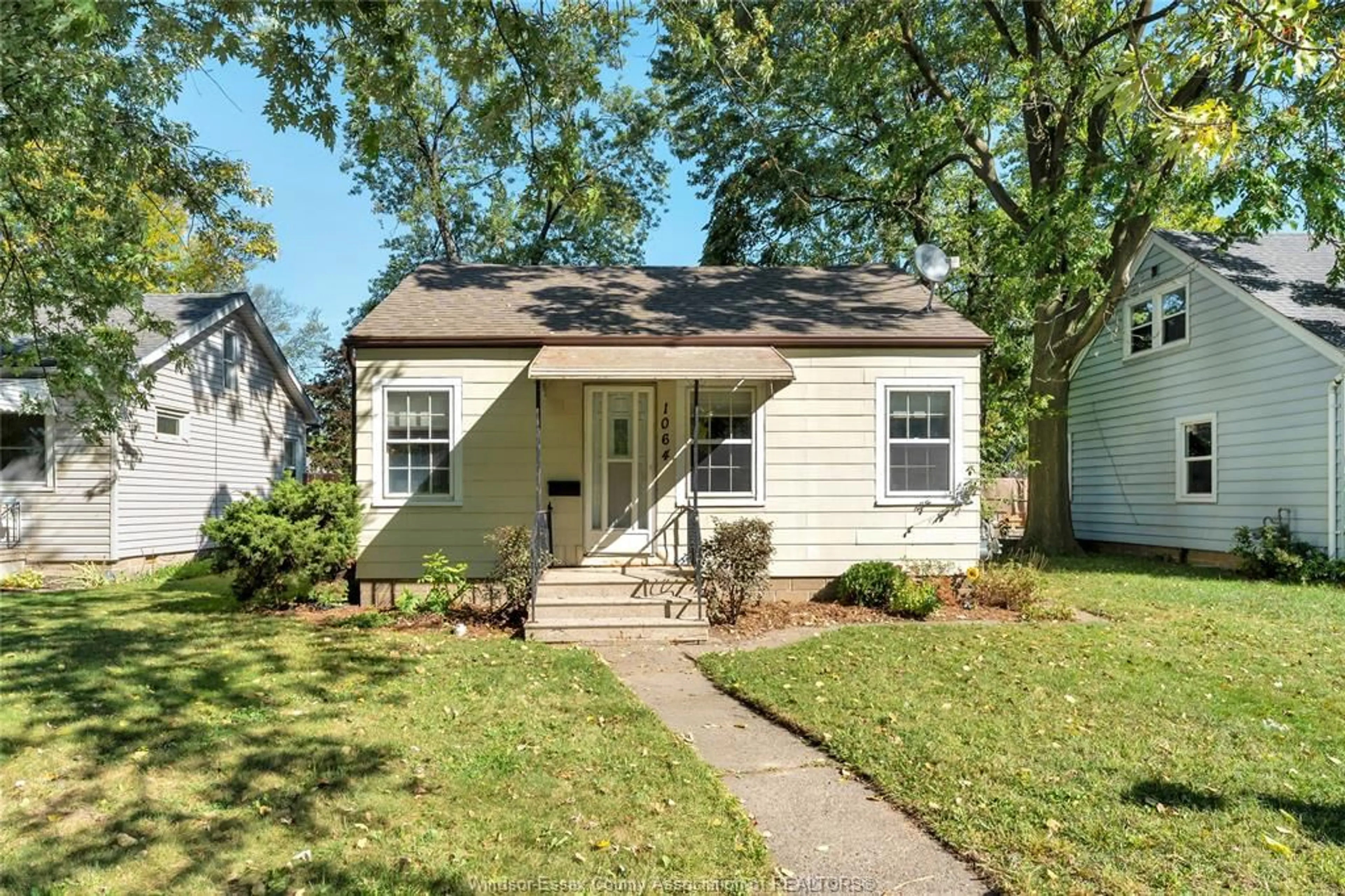 Home with vinyl exterior material, street for 1064 Prince Rd, Windsor Ontario N9C 2Z7