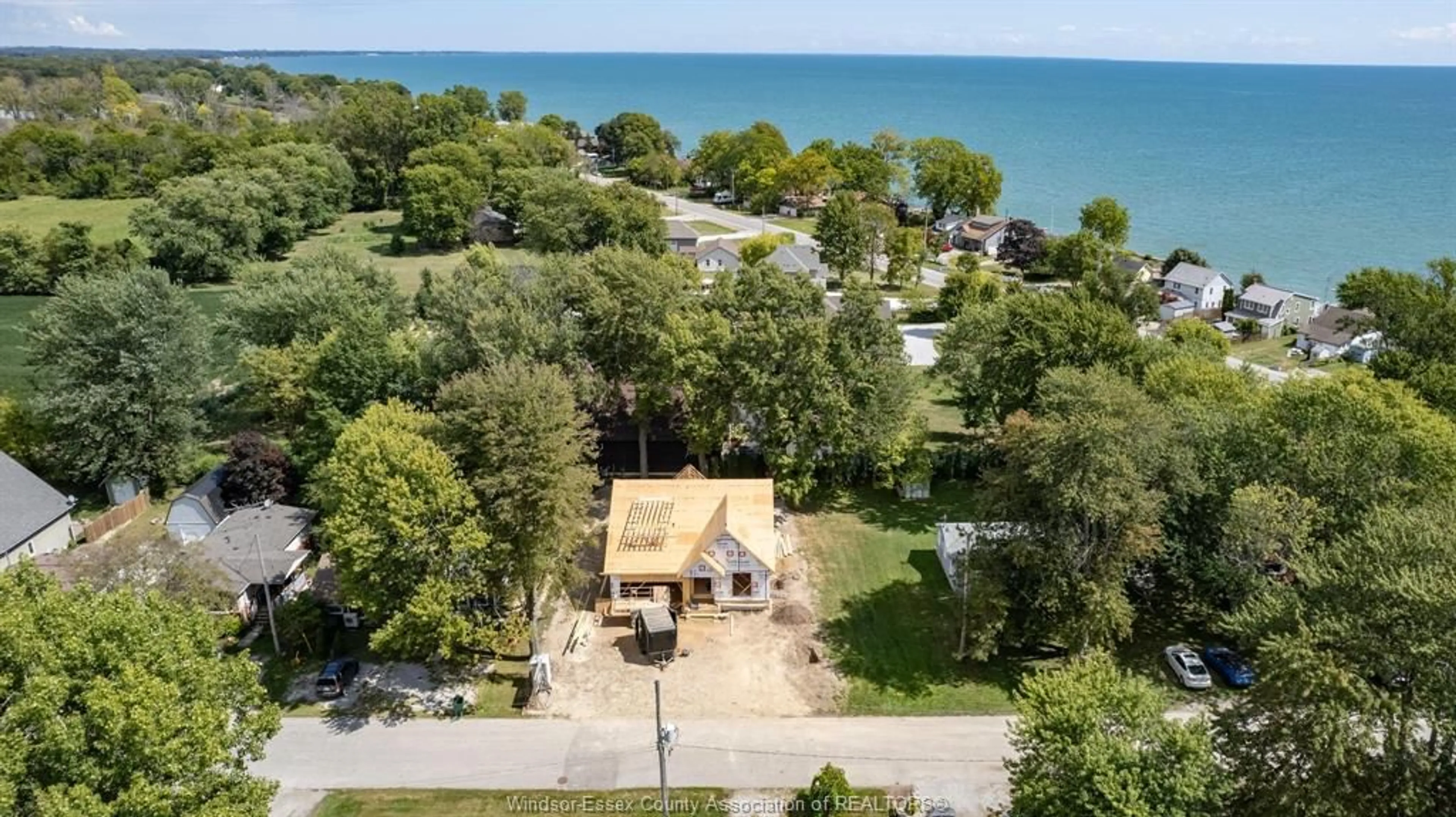 A pic from outside/outdoor area/front of a property/back of a property/a pic from drone, water/lake/river/ocean view for 252 FORD Rd, Kingsville Ontario N9Y 3X2