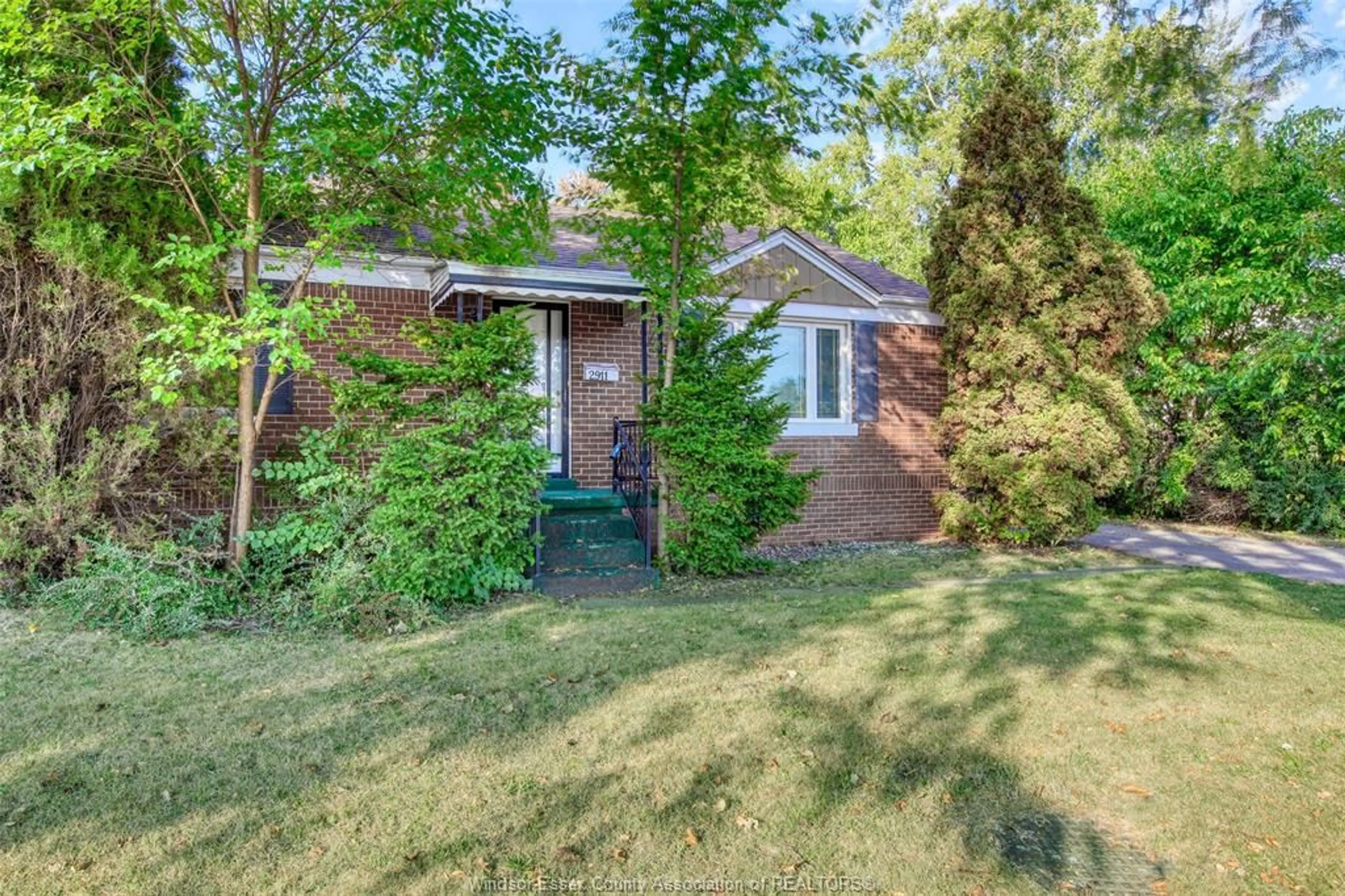 Home with brick exterior material, street for 2911 DOMINION, Windsor Ontario N9E 2N1