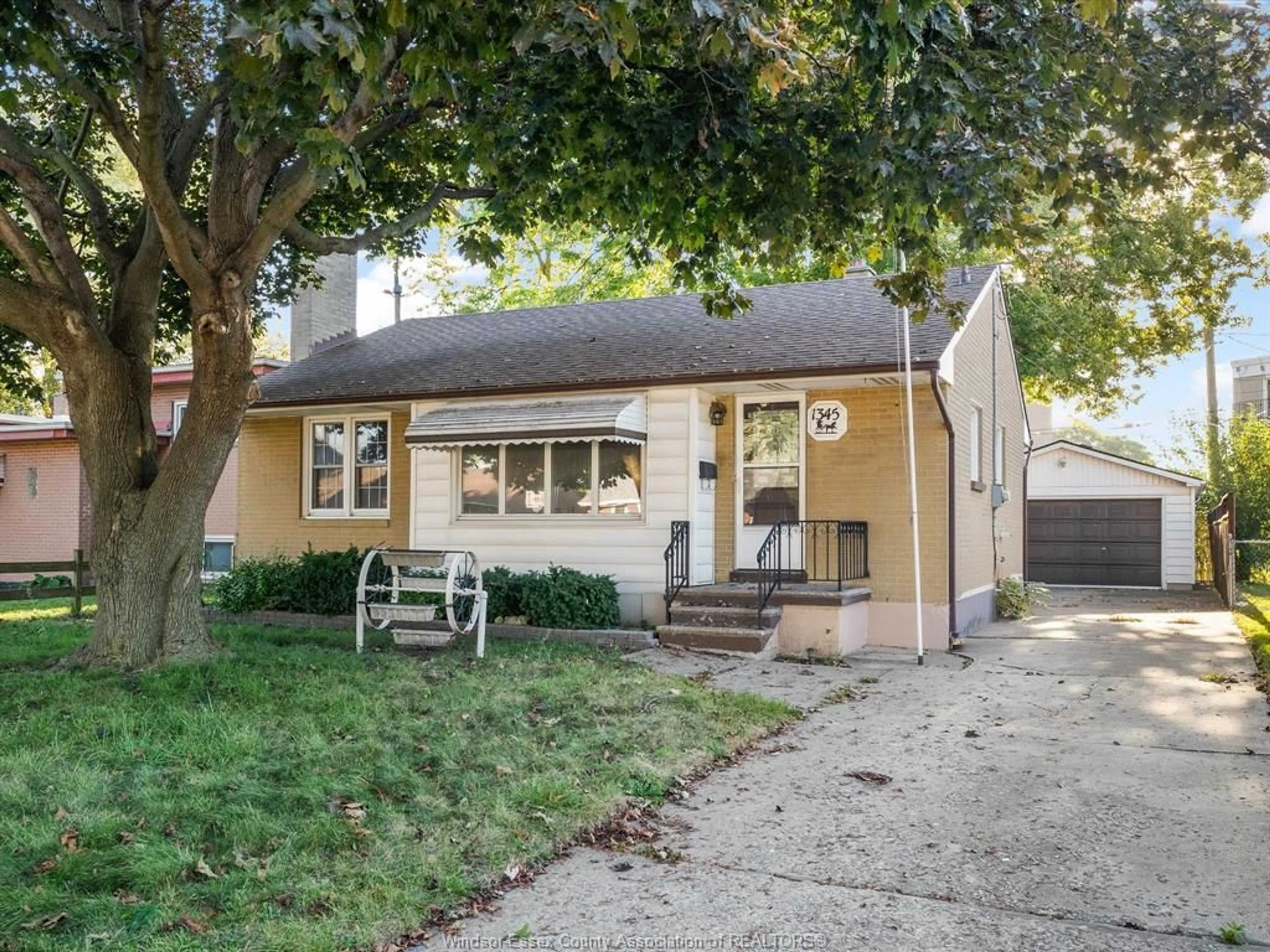 Home with vinyl exterior material, street for 1345 MARLBOROUGH Blvd, Windsor Ontario N9C 1Y8
