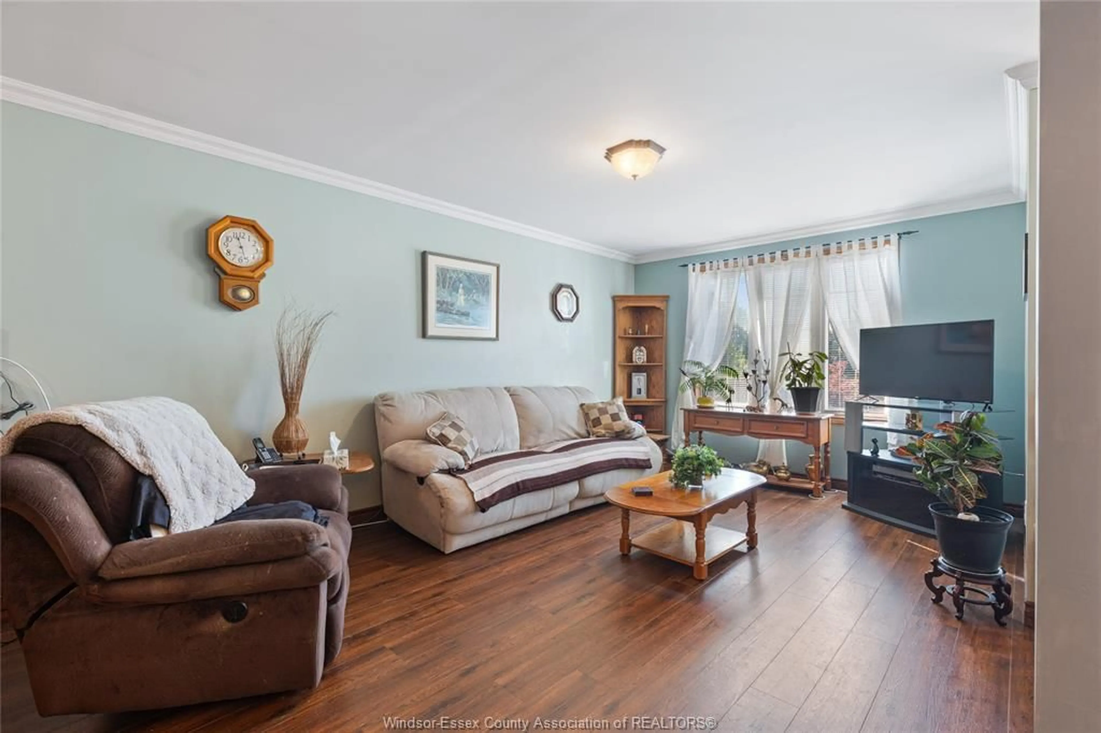 Living room with furniture, wood/laminate floor for 1212 SETTLER`S, Windsor Ontario N9G 2W8