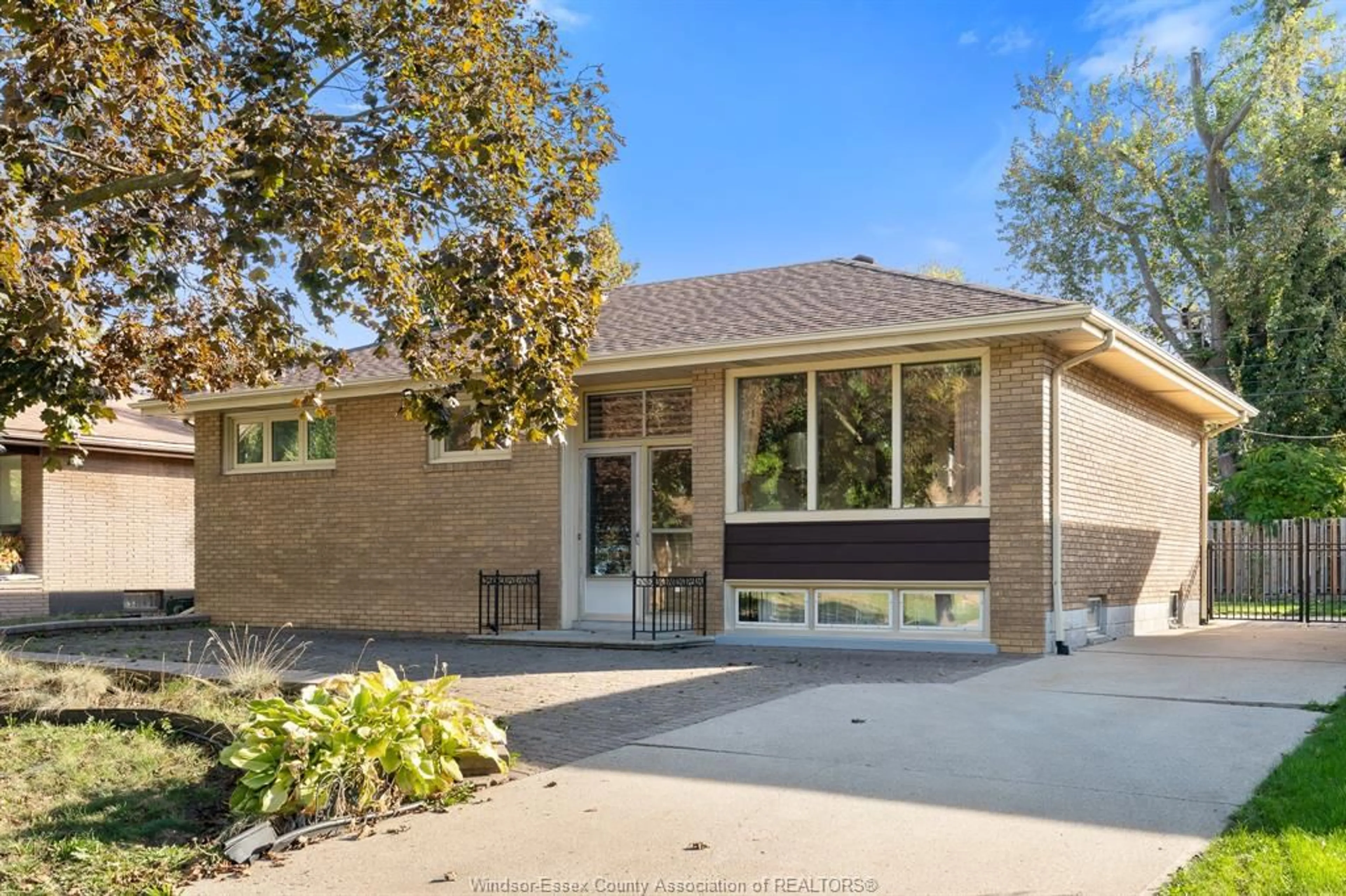 Home with brick exterior material, street for 522 GREENDALE Dr, Windsor Ontario N8S 4A8