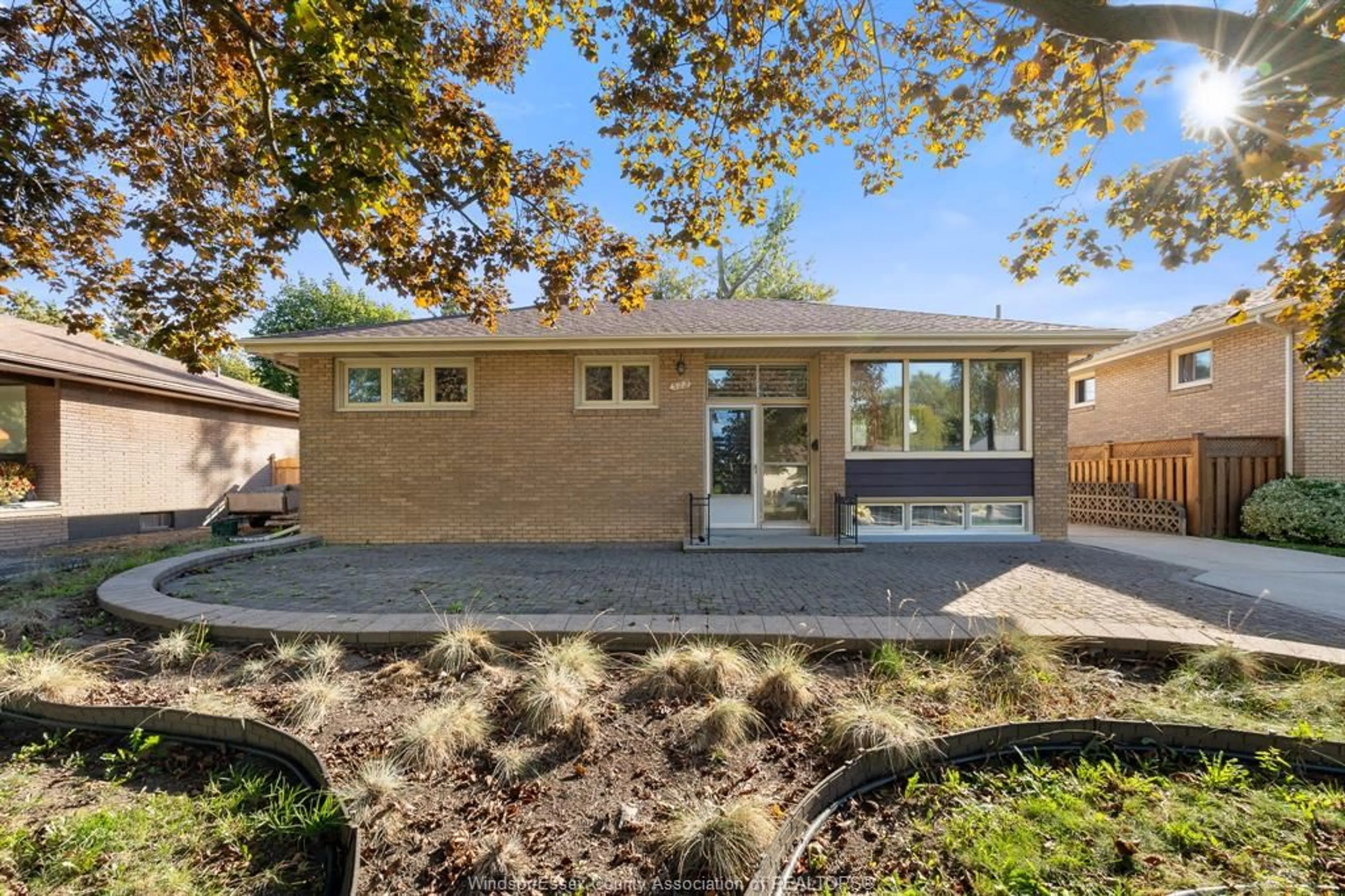 Home with brick exterior material, street for 522 GREENDALE Dr, Windsor Ontario N8S 4A8