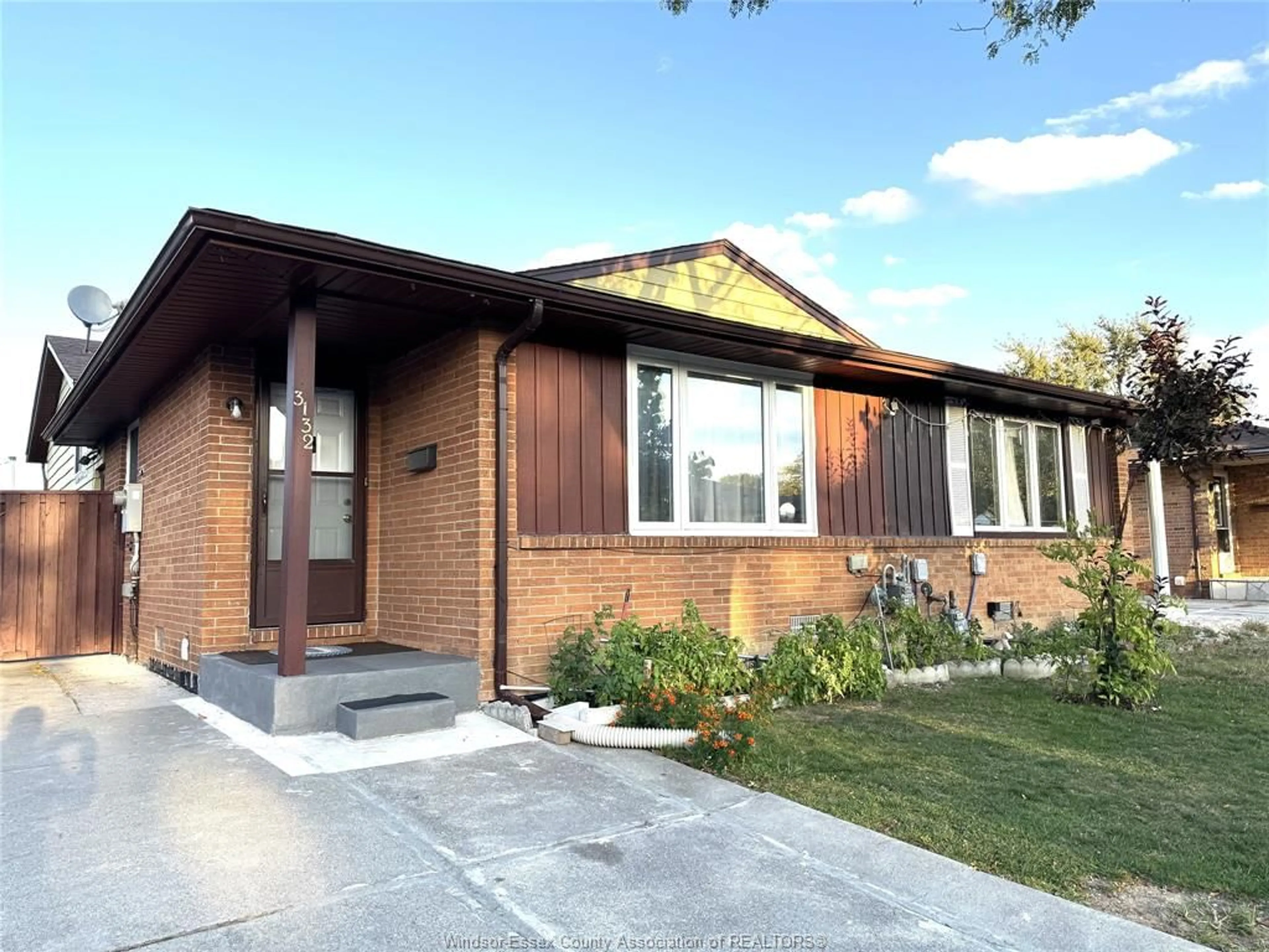 Home with brick exterior material, street for 3132 ELMWOOD Cres, Windsor Ontario N8R 1X4