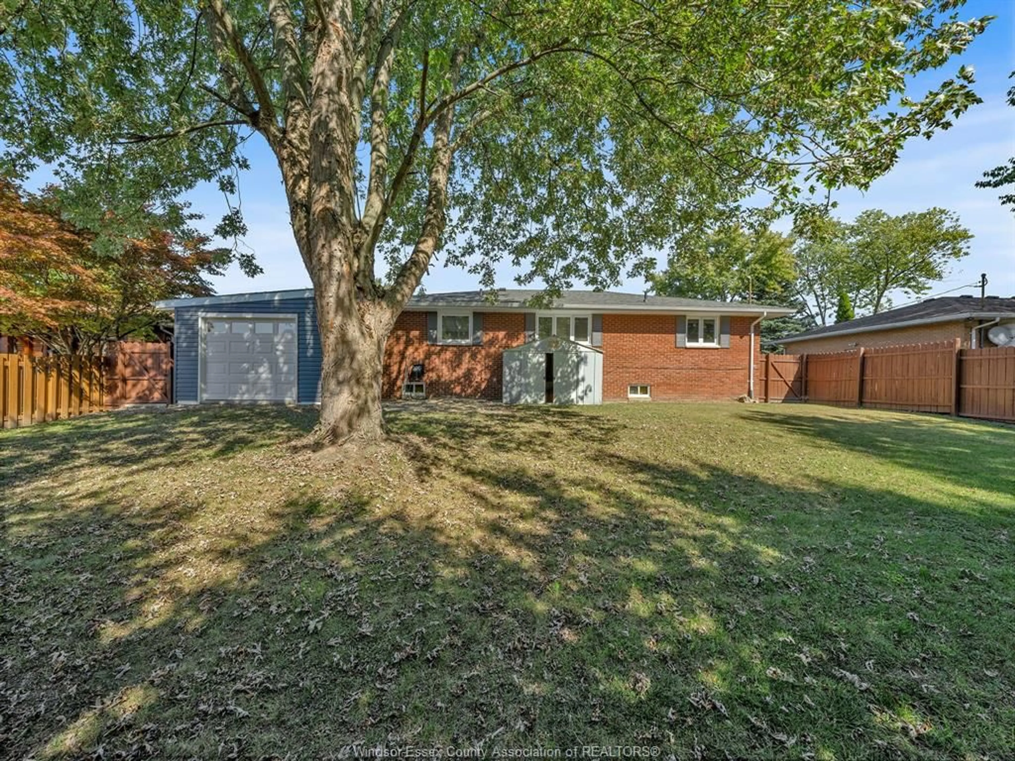 A pic from outside/outdoor area/front of a property/back of a property/a pic from drone, street for 310 MARTIN Lane, LaSalle Ontario N9J 2M3