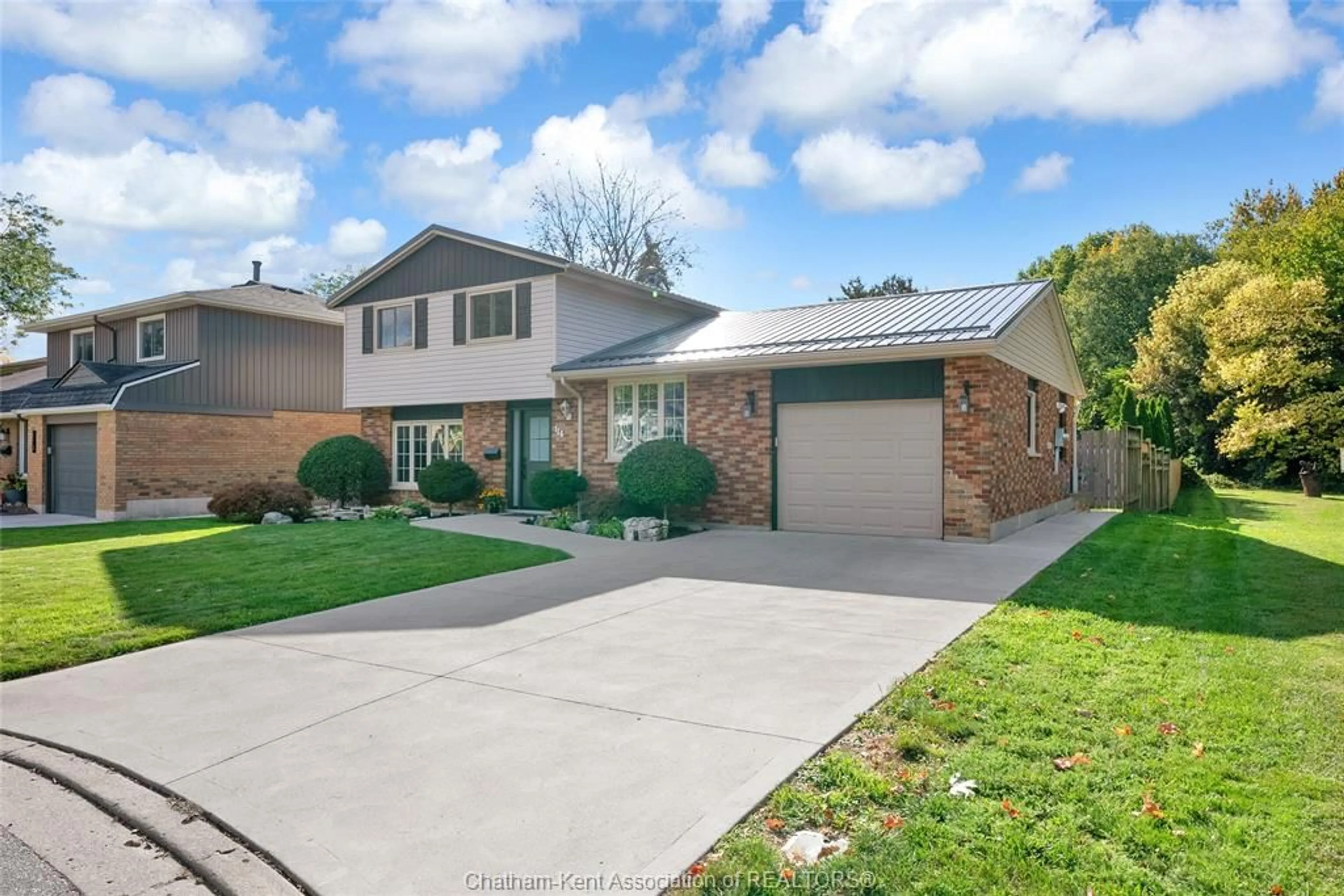 Home with brick exterior material, street for 116 Thornhill Cres, Chatham Ontario N7L 4M3