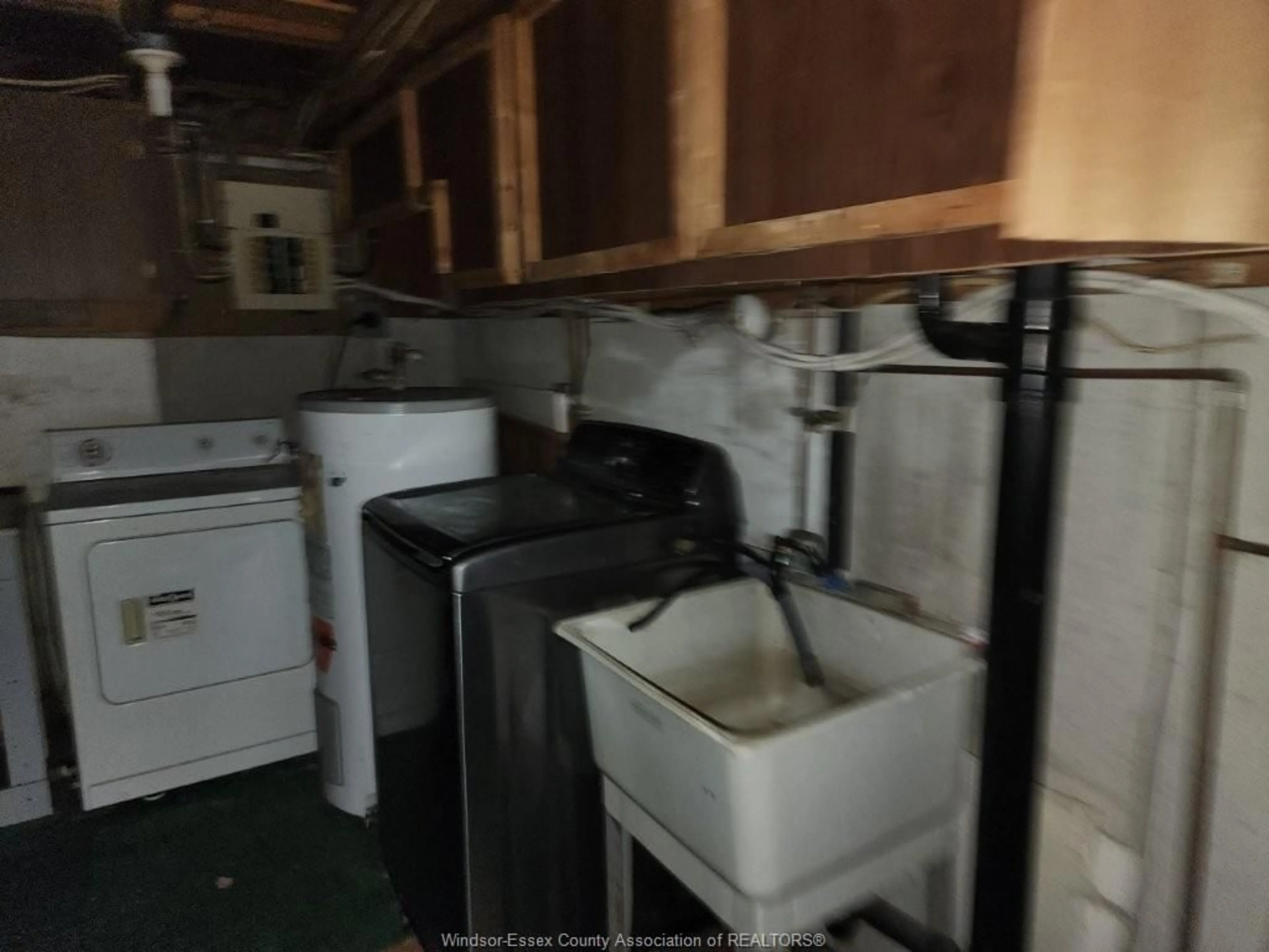 Kitchen with laundary machines, floor is not visible for 9014 COPPERFIELD Crt, Windsor Ontario N8S 4H3