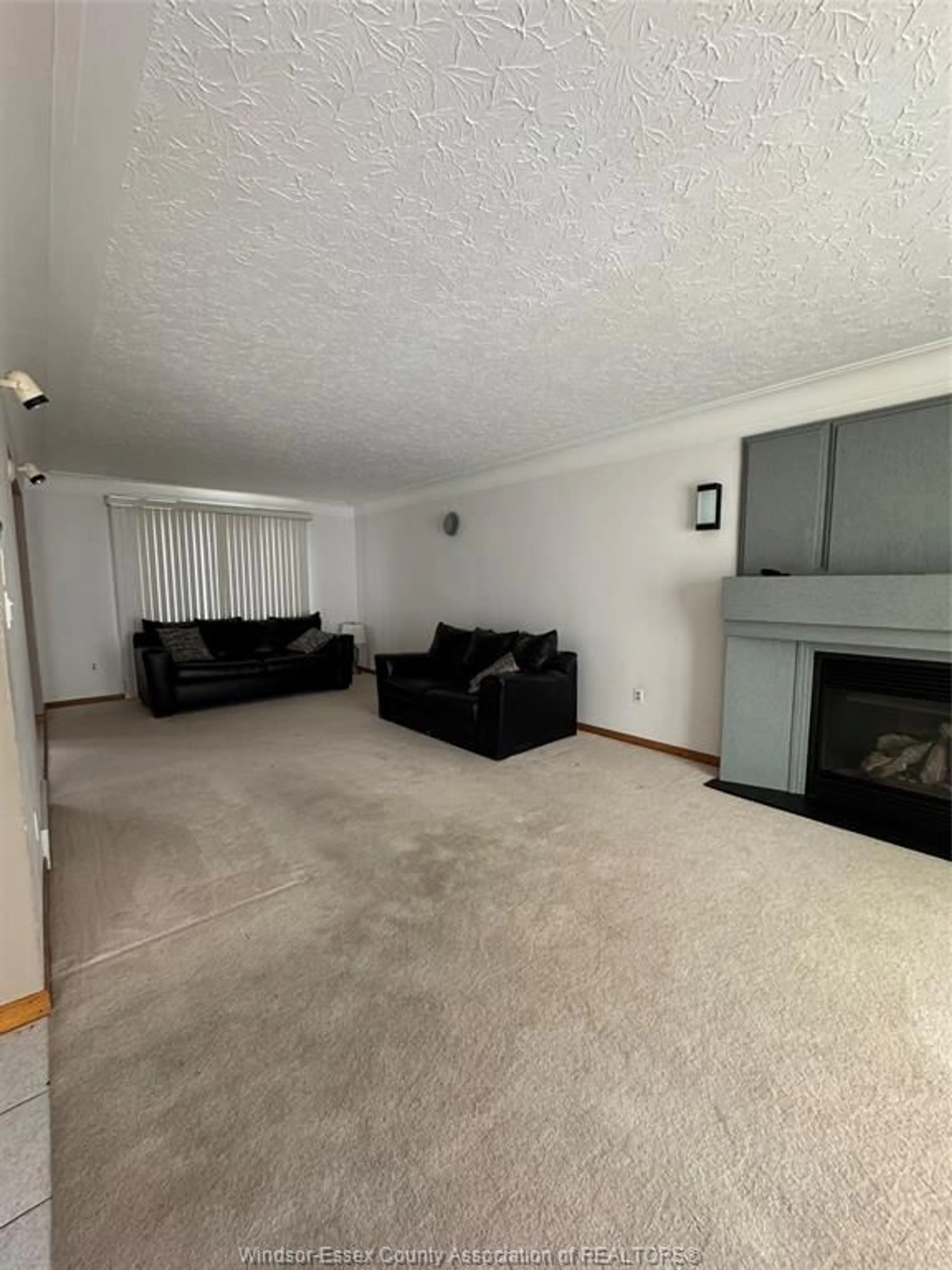 Living room with furniture, unknown for 5515 OUTER Dr, Windsor Ontario N9A 6J3