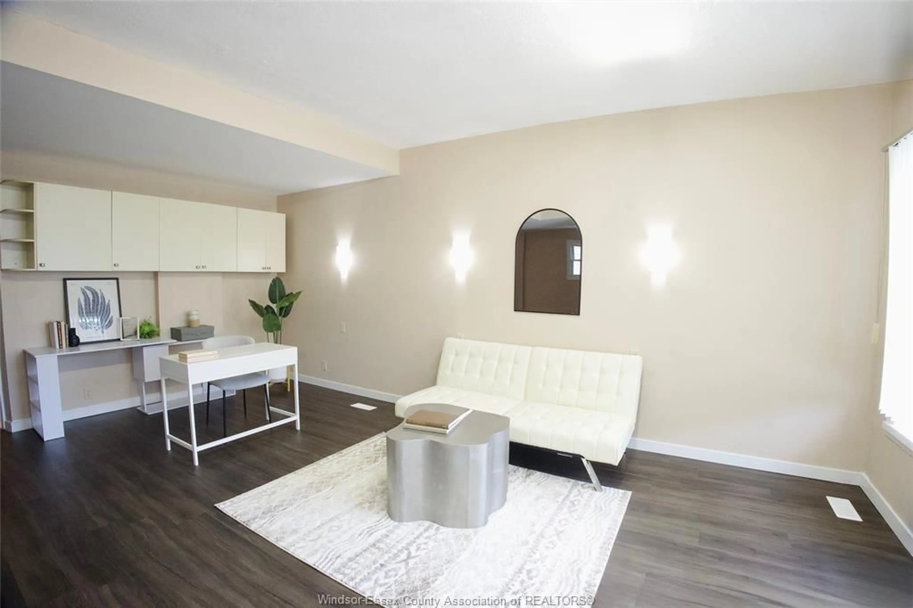 Living room with furniture, wood/laminate floor for 1637 DROUILLARD, Windsor Ontario N8Y 2S4