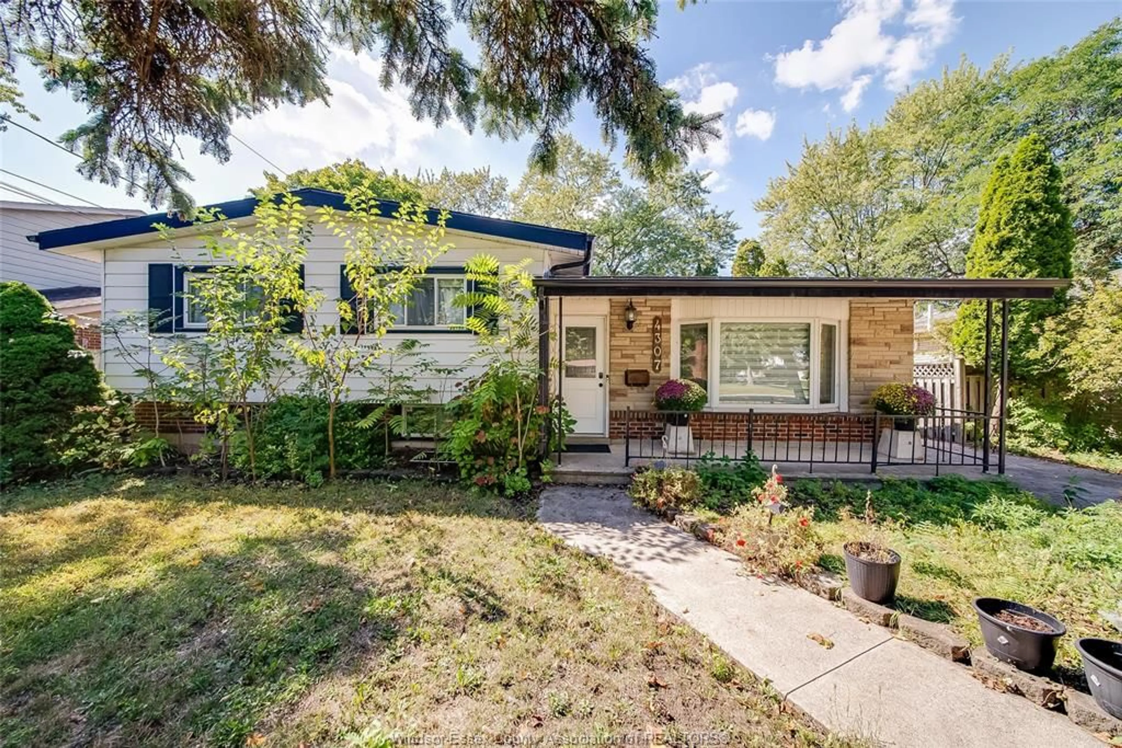 Home with brick exterior material, street for 4307 ASHFIELD Cres, Windsor Ontario N9G 2G8