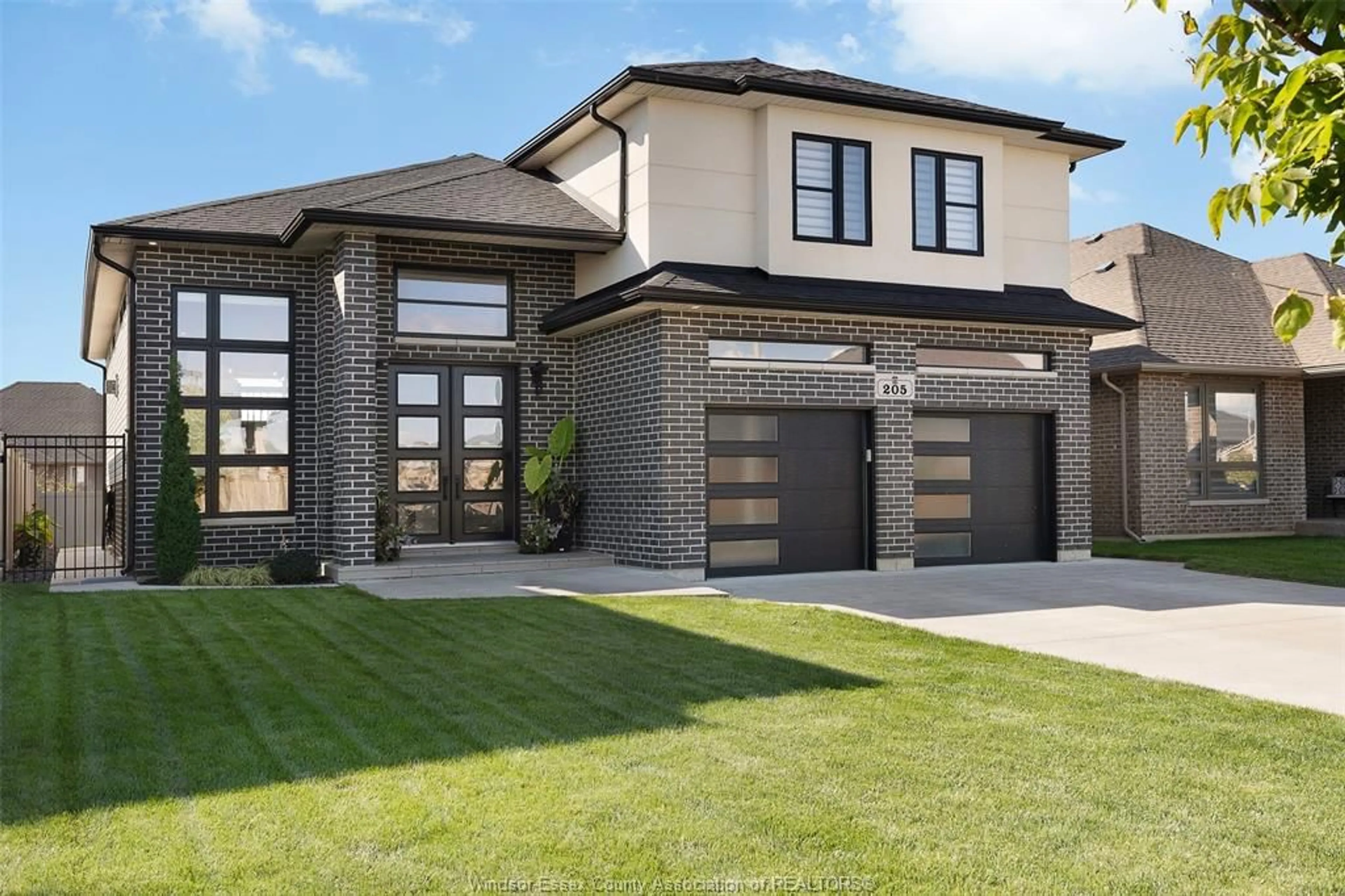 Home with brick exterior material, street for 205 MULLEN Cres, Amherstburg Ontario N9V 0C2