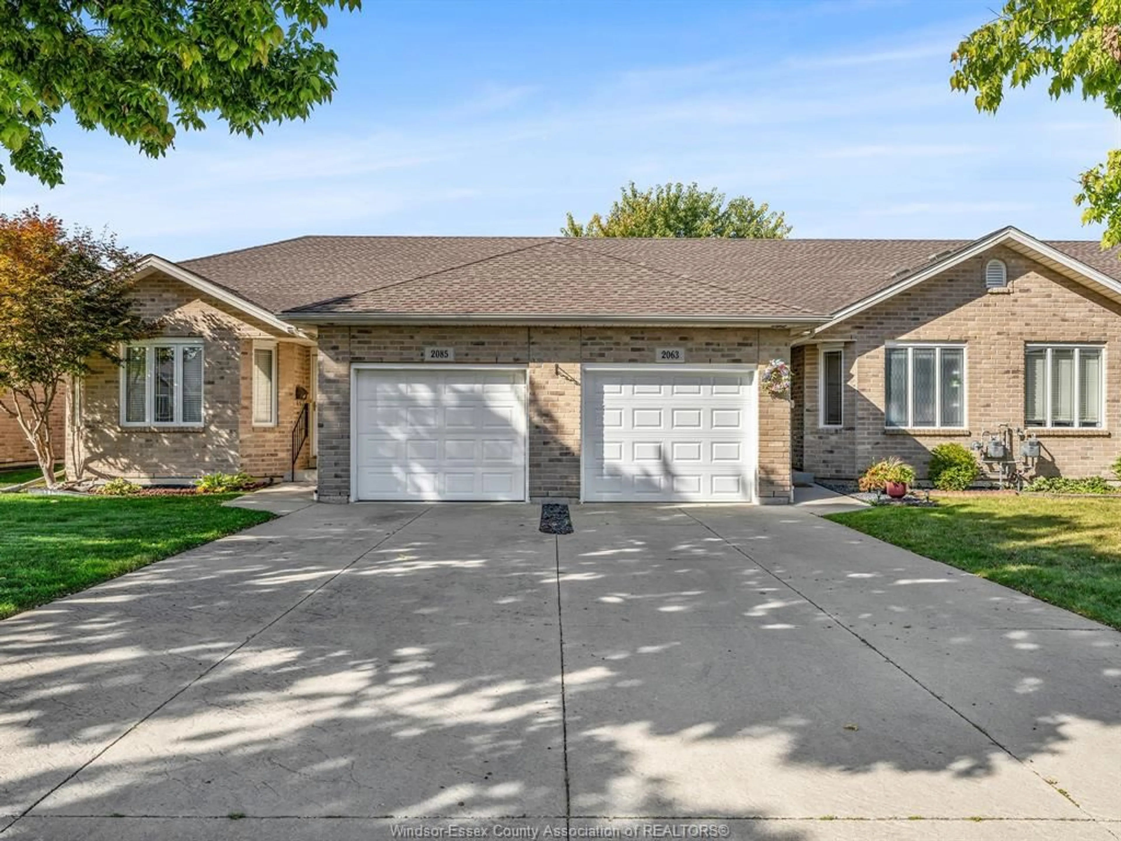 Home with brick exterior material, street for 2085 CLOVER Ave, Windsor Ontario N8P 1W5