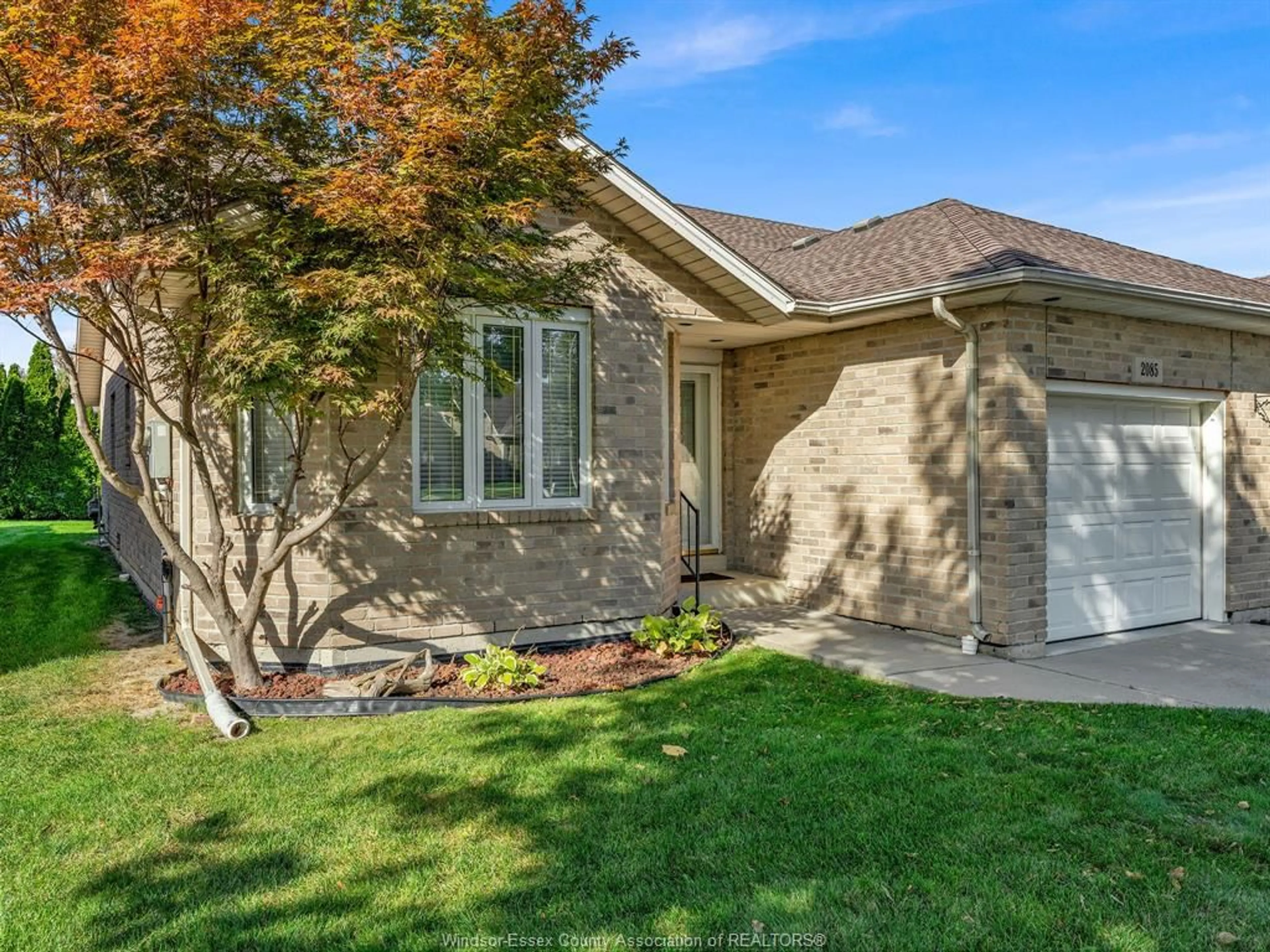 Home with brick exterior material, street for 2085 CLOVER Ave, Windsor Ontario N8P 1W5