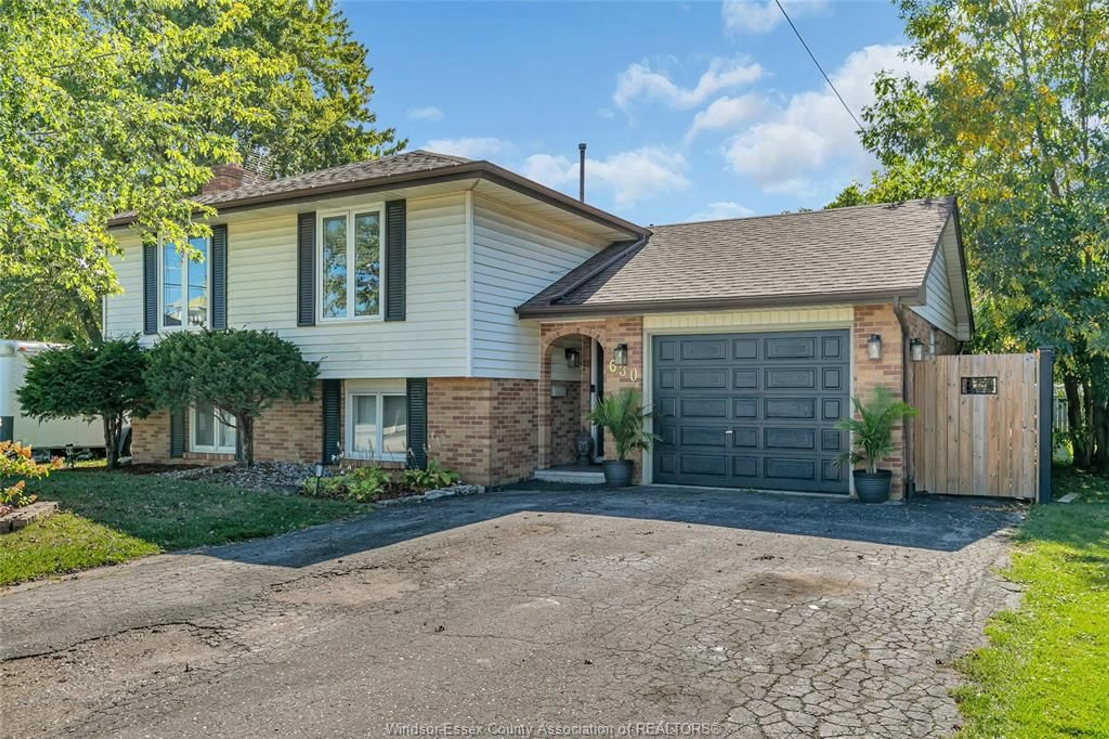 Home with brick exterior material, street for 630 ST. CHARLES St, Belle River Ontario N0R 1A0