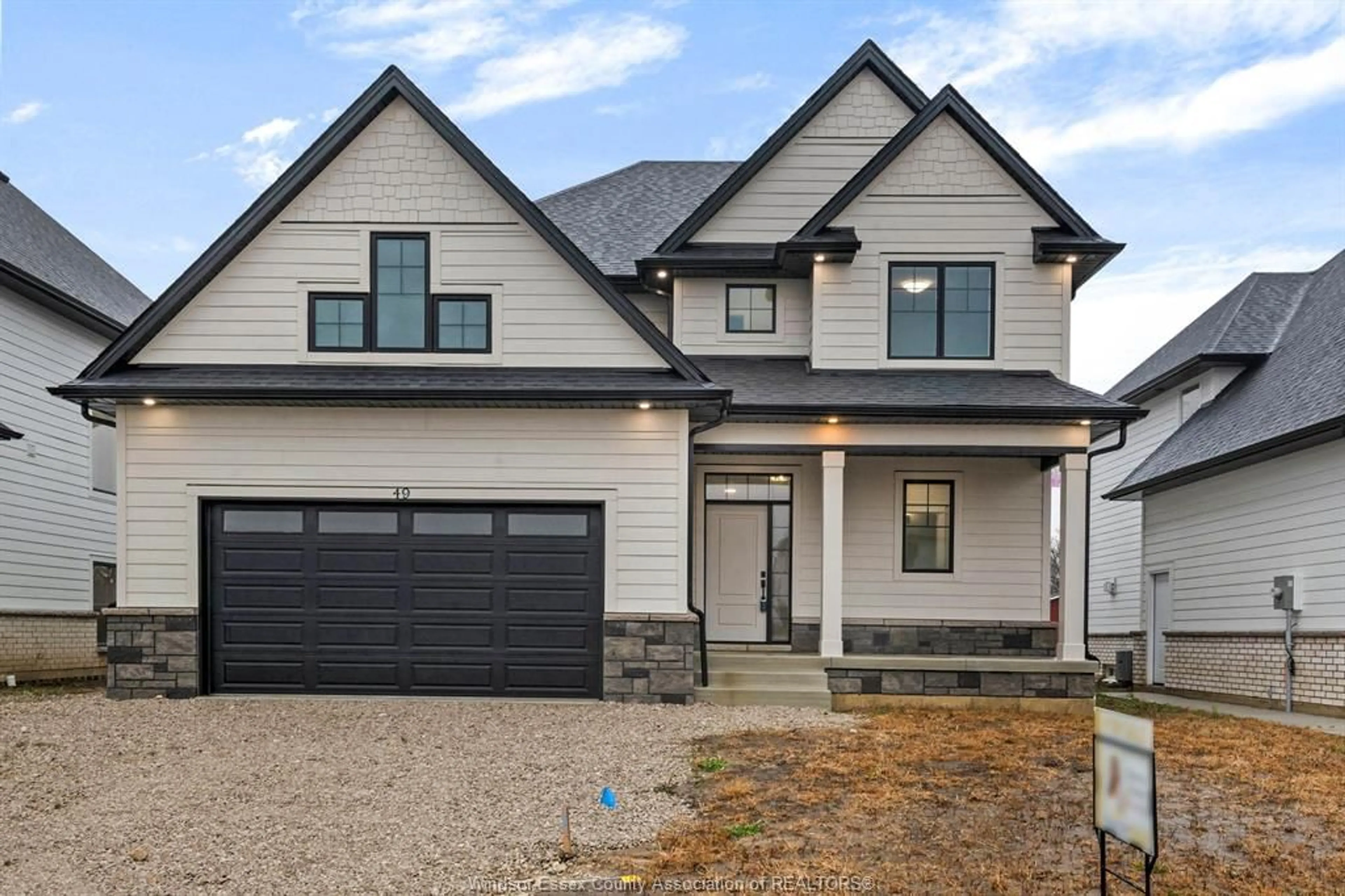 Home with brick exterior material, street for 49 BELLEVIEW Dr, Kingsville Ontario N0R 1B0