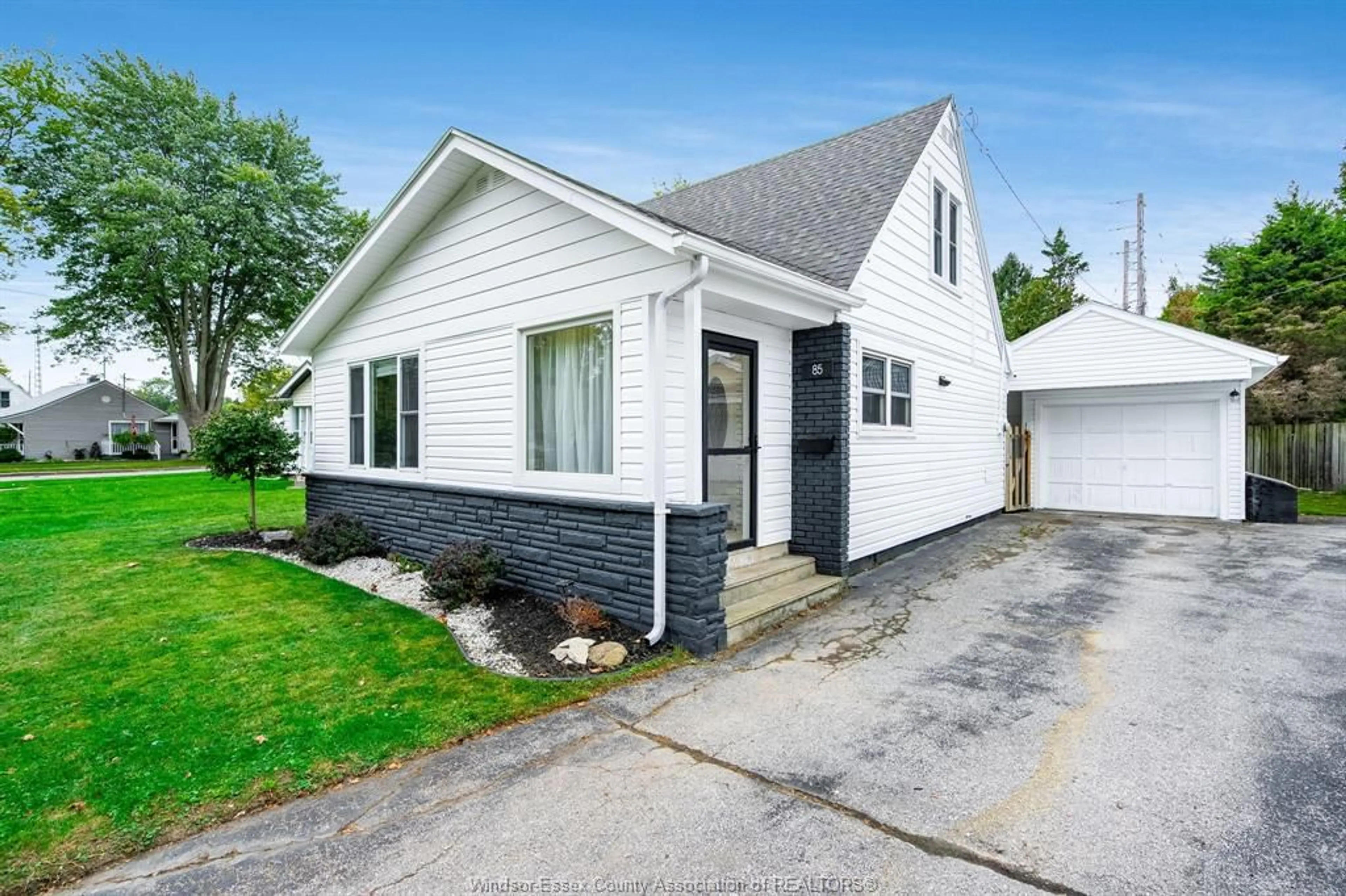 Home with vinyl exterior material, street for 85 Orange St, Leamington Ontario N8H 1R1