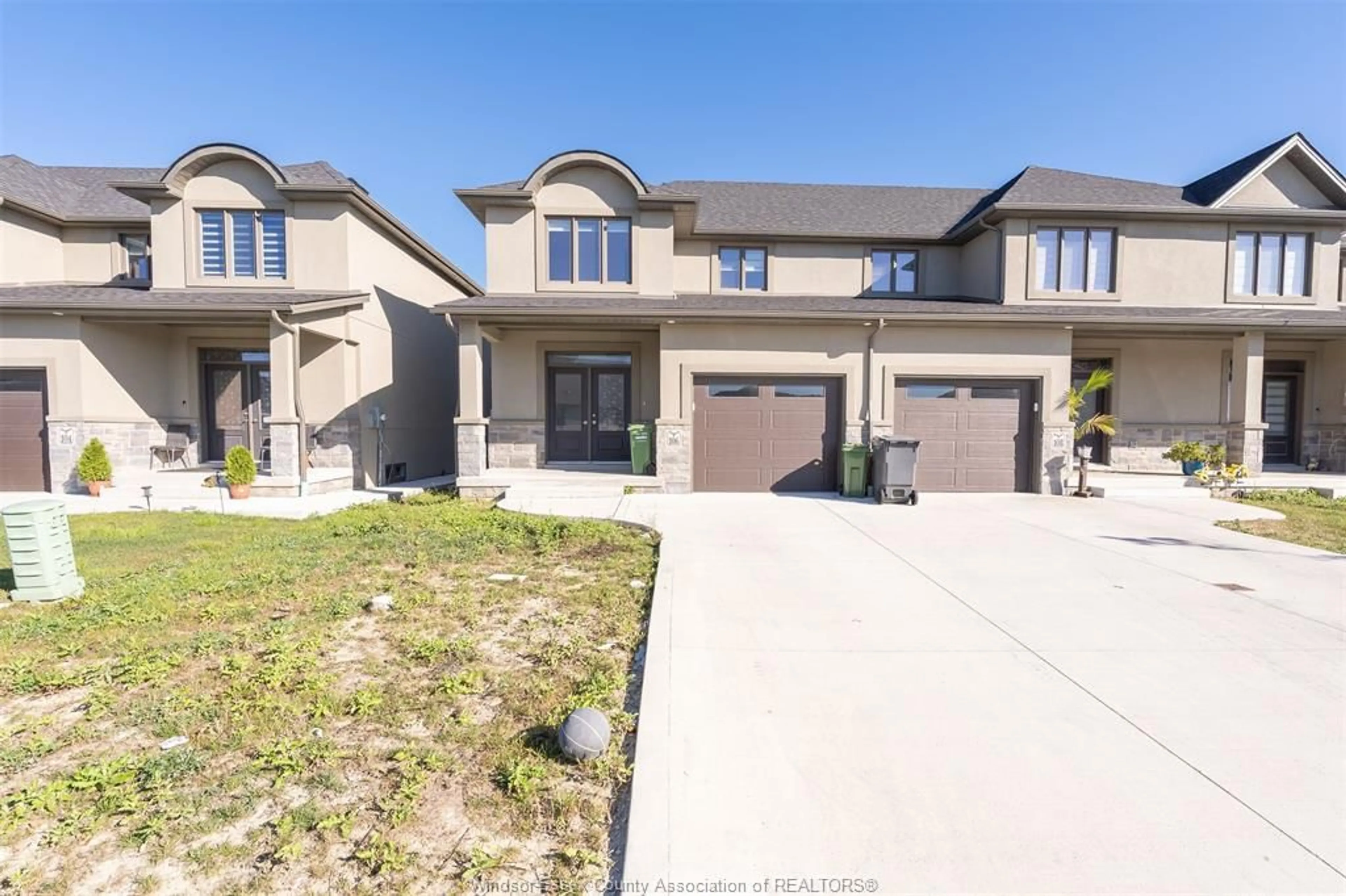 Home with brick exterior material, street for 106 LANE St, Essex Ontario N8M 2X6