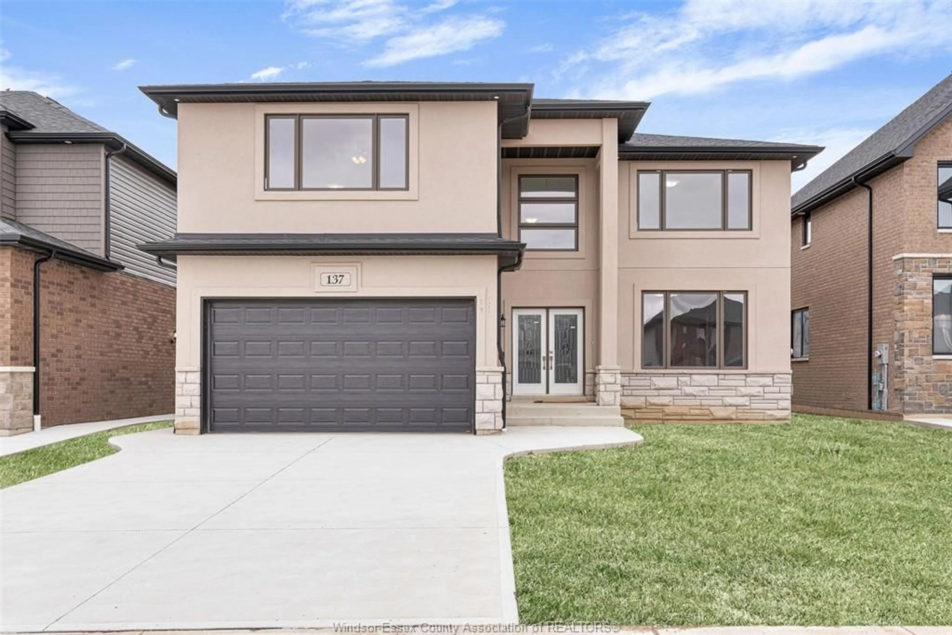 Home with brick exterior material, street for 137 TUSCANY Trail, Chatham Ontario N7M 0A7