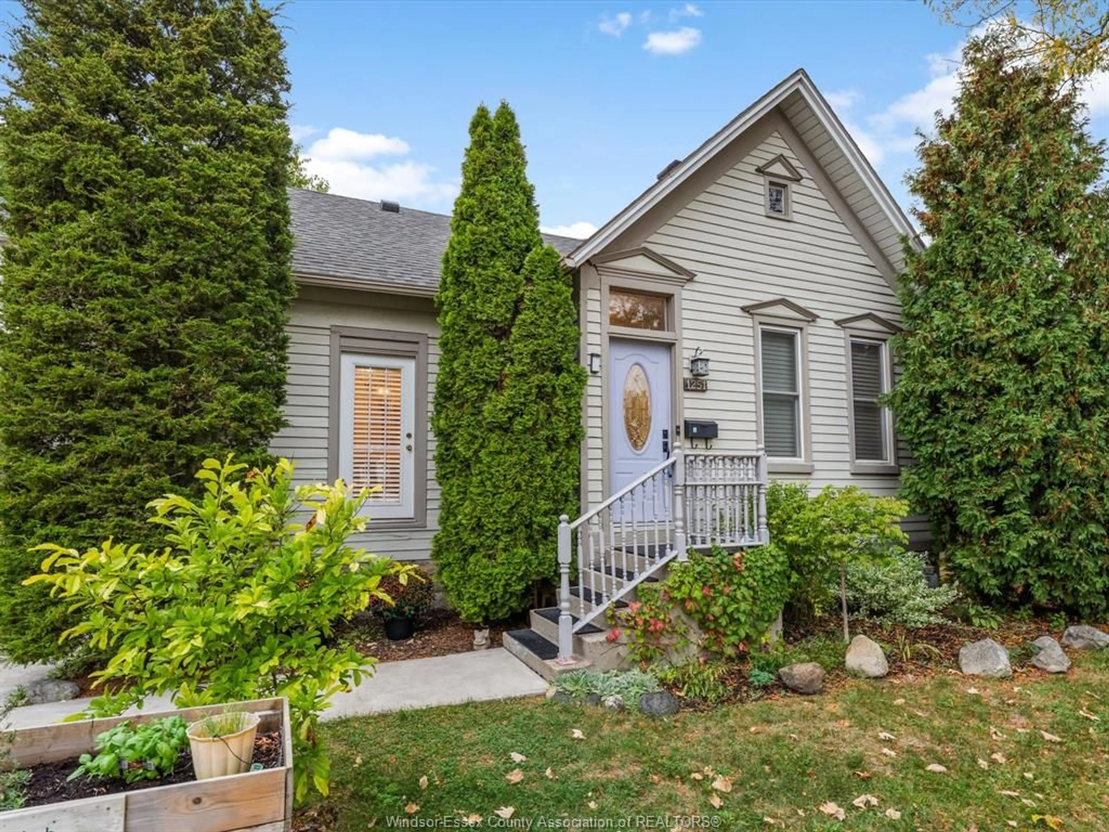 Home with vinyl exterior material, street for 1251 MONMOUTH, Windsor Ontario N8Y 3M2