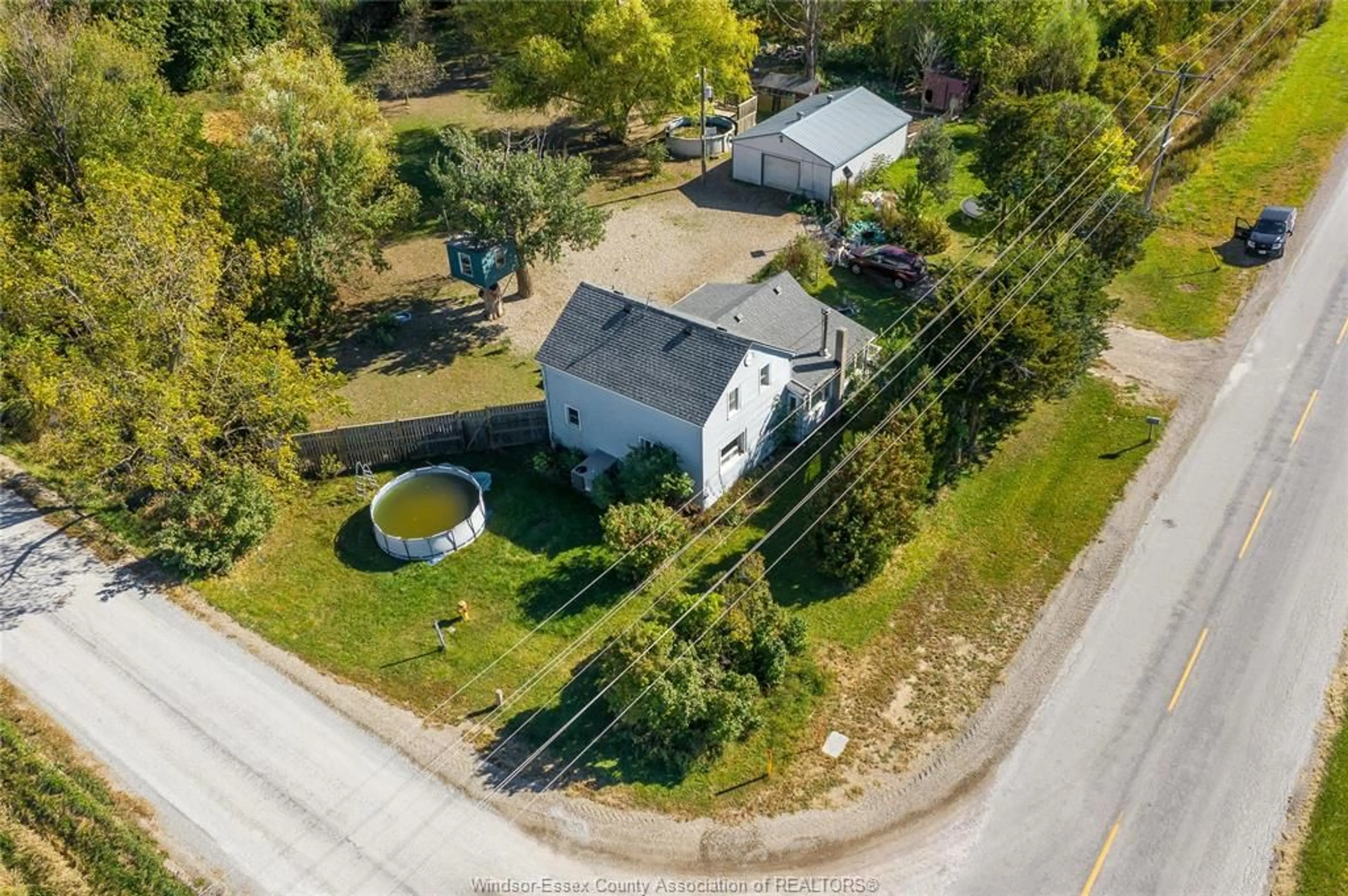 A pic from outside/outdoor area/front of a property/back of a property/a pic from drone, street for 7151 CONCESSION 7, Harrow Ontario N9V 2Y7