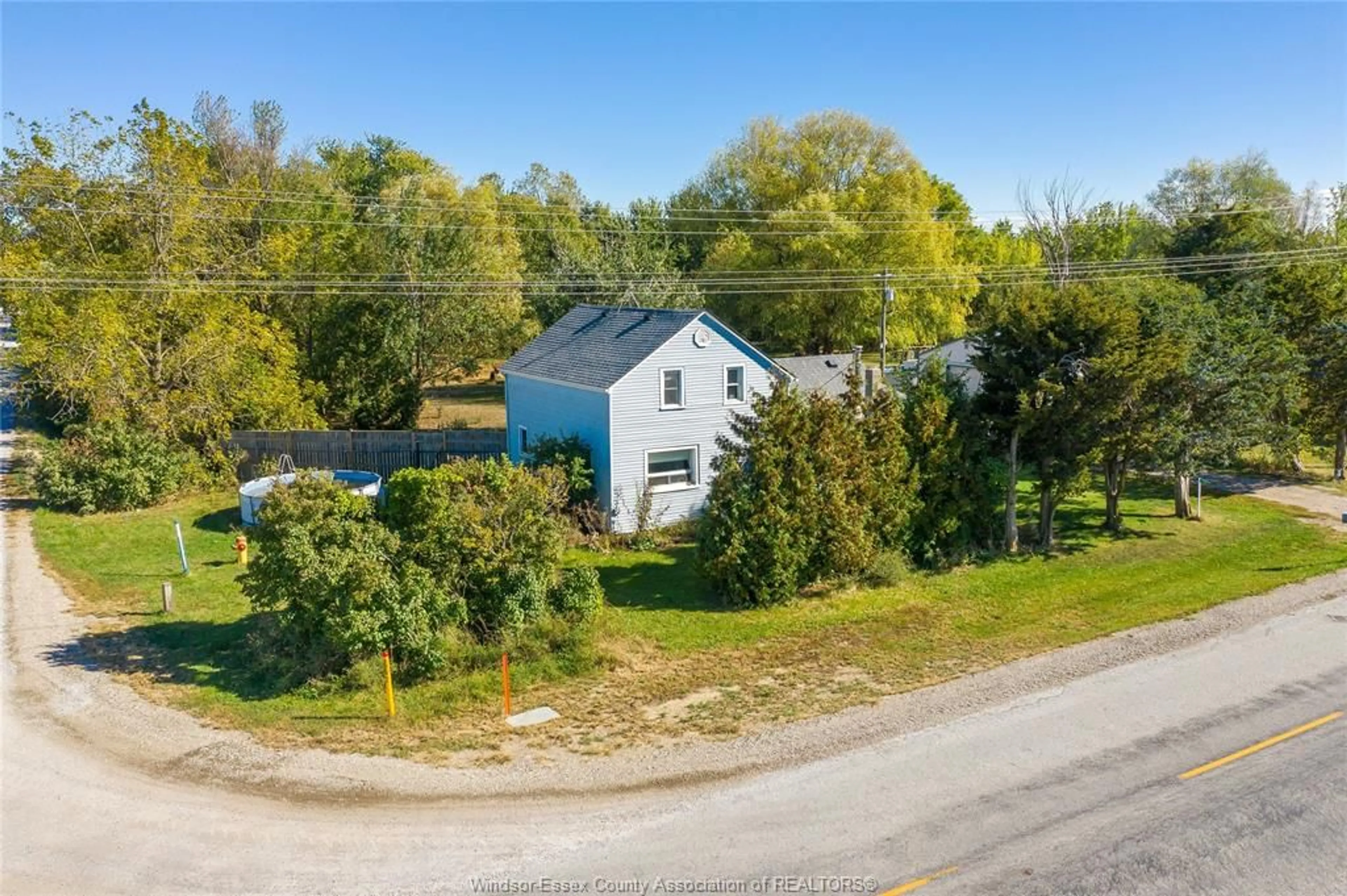 A pic from outside/outdoor area/front of a property/back of a property/a pic from drone, street for 7151 CONCESSION 7, Harrow Ontario N9V 2Y7