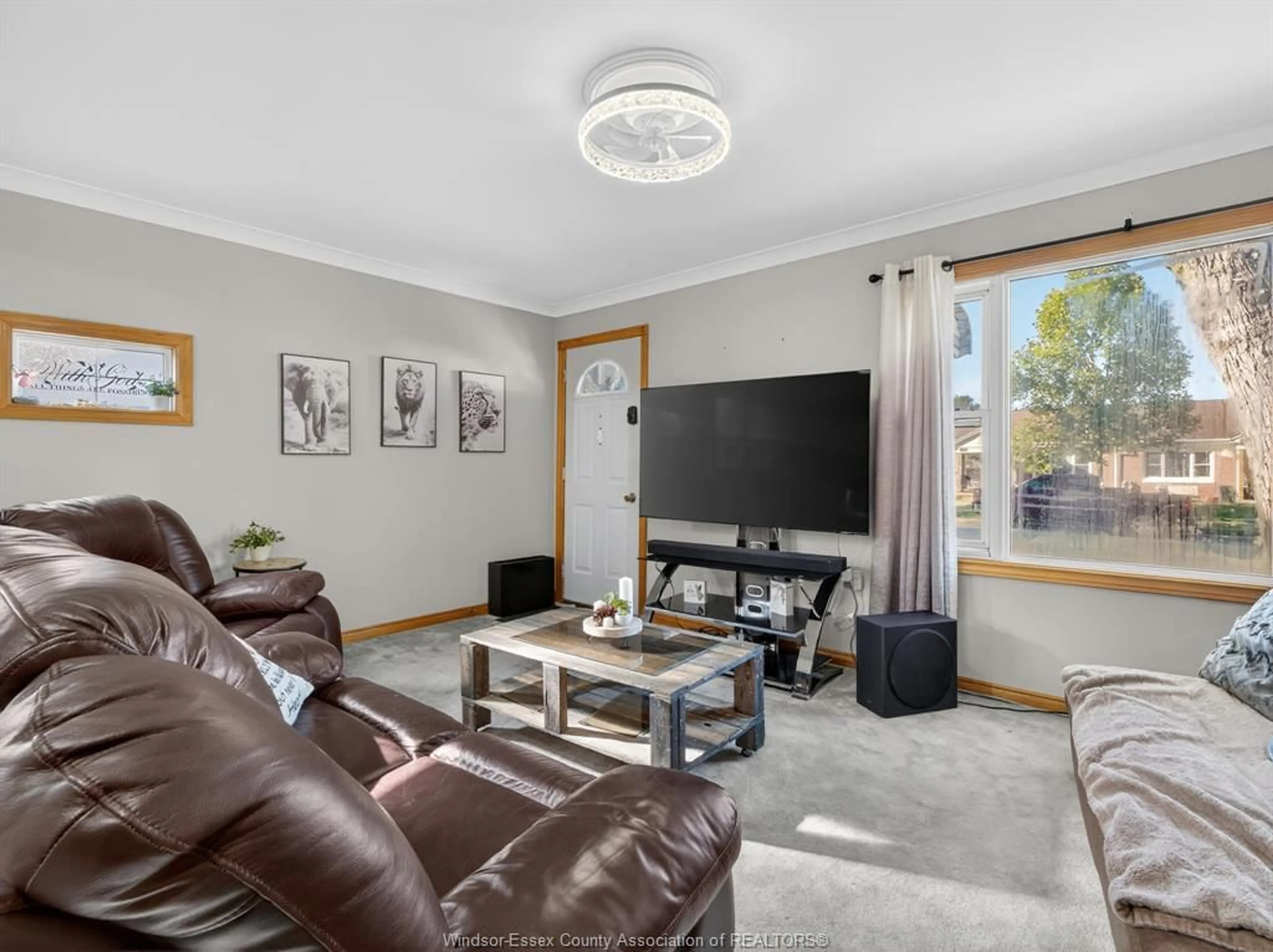 Living room with furniture, wood/laminate floor for 1242 PARTINGTON Ave, Windsor Ontario N9B 2P4